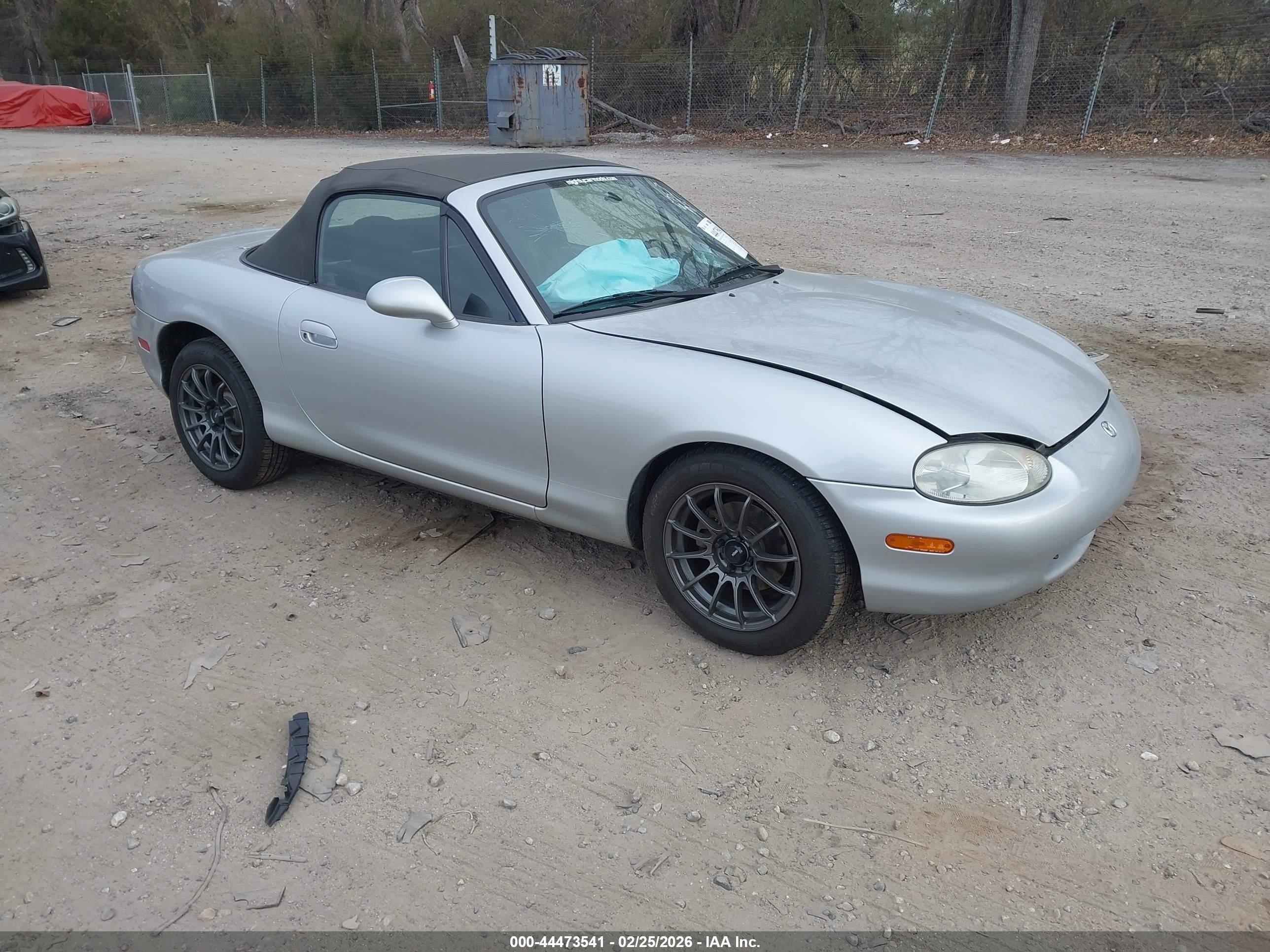 1999 Mazda MX-5 Miata, VIN JM1NB3531X0116757 — Side