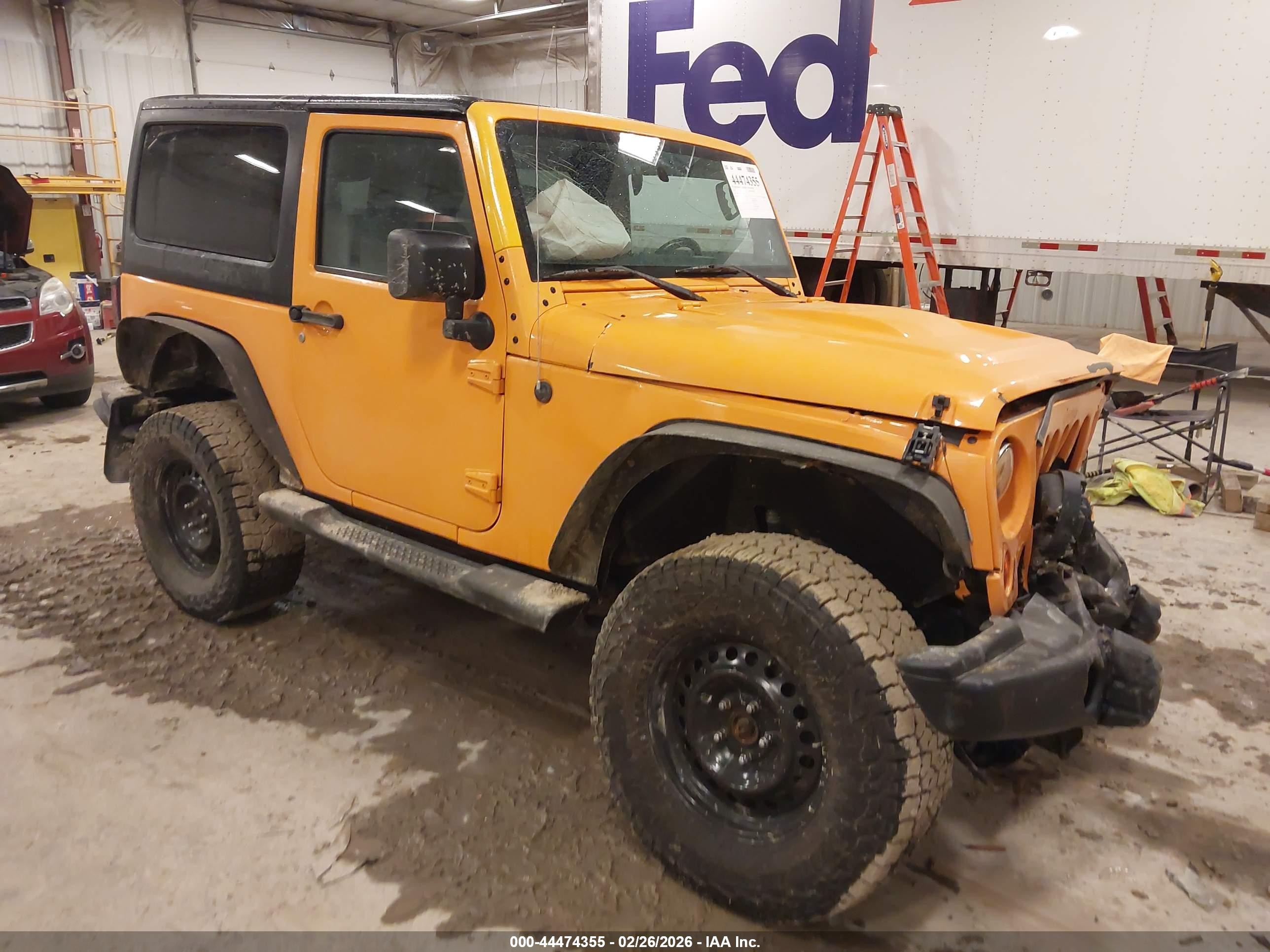2012 Jeep Wrangler Sport, VIN 1C4AJWAG9CL174006 — Front end