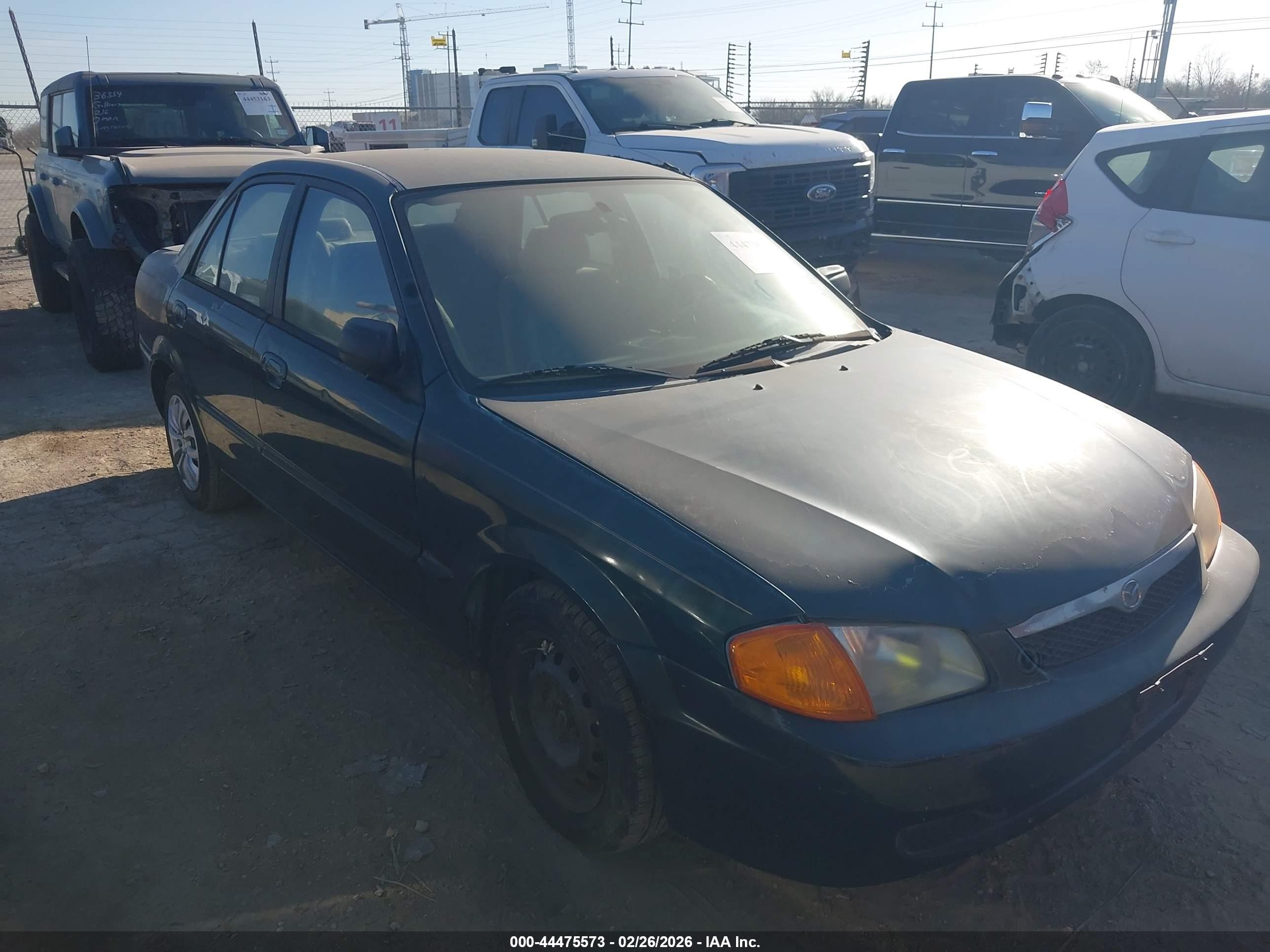2000 Mazda Protege DX, VIN JM1BJ2222Y0270939 — All over