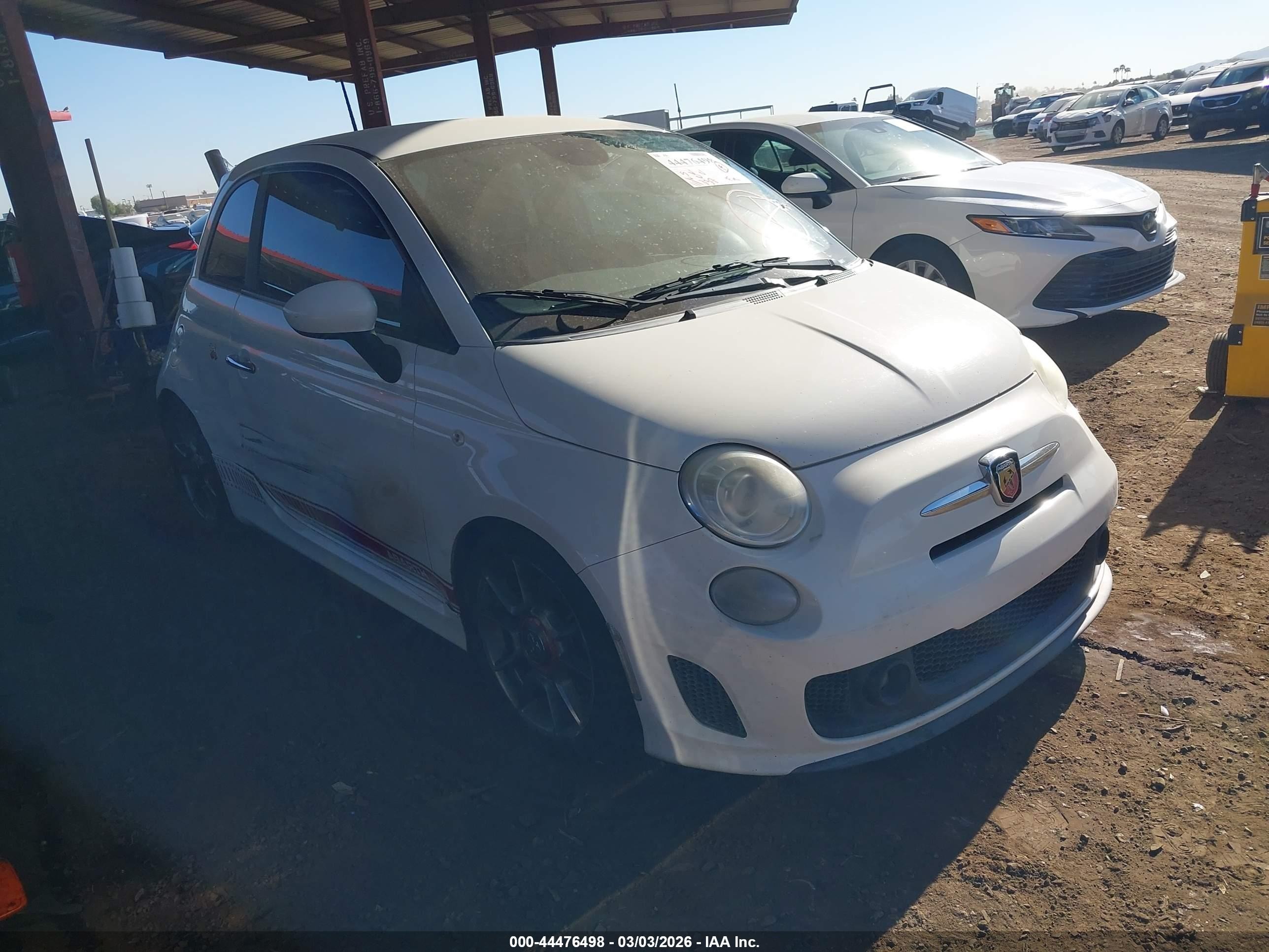 2014 FIAT 500 Abarth, VIN 3C3CFFFH0ET288581 — Side
