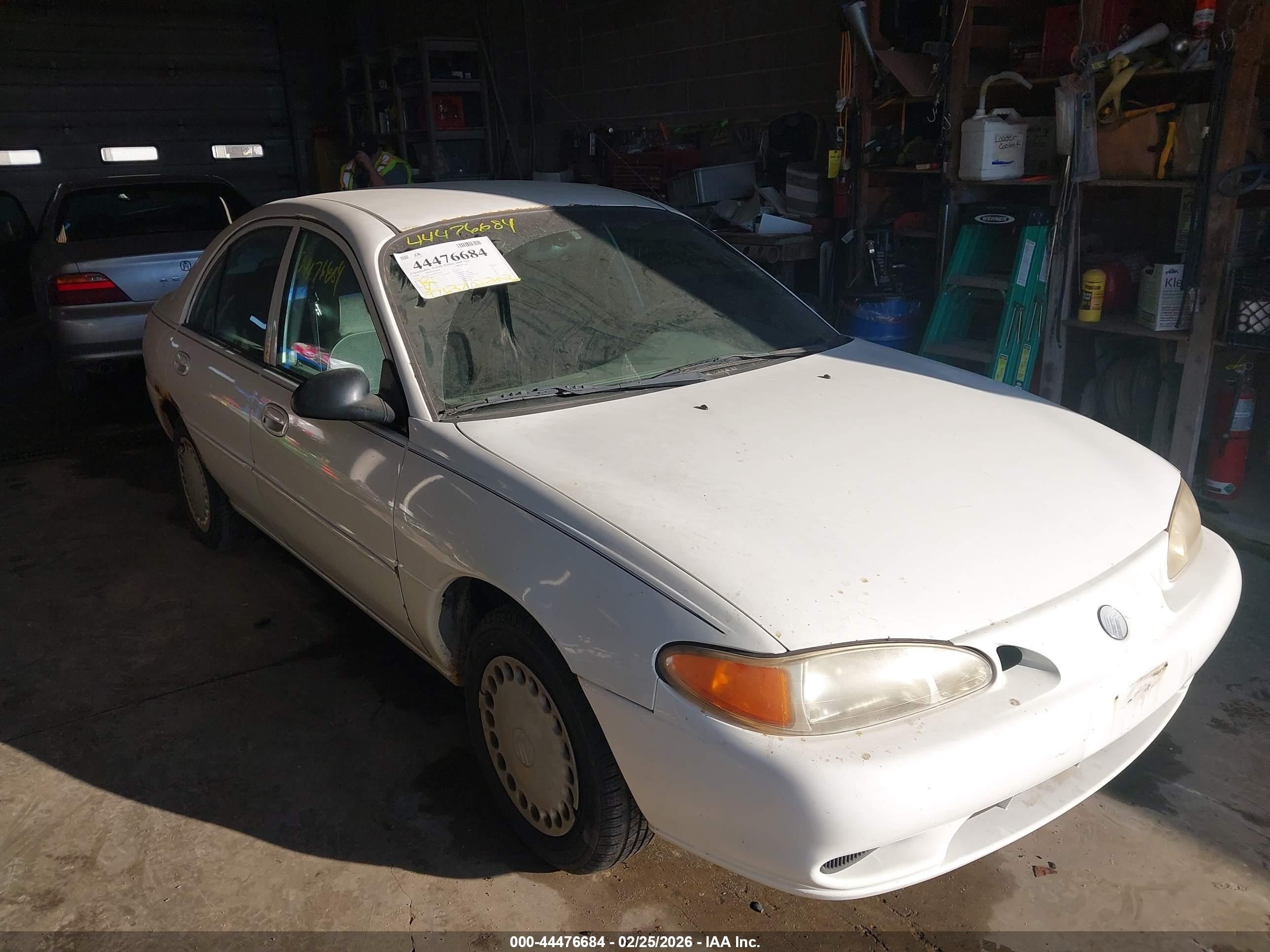 1998 Mercury Tracer GS, VIN 1MEFM10P4WW632828 — Side