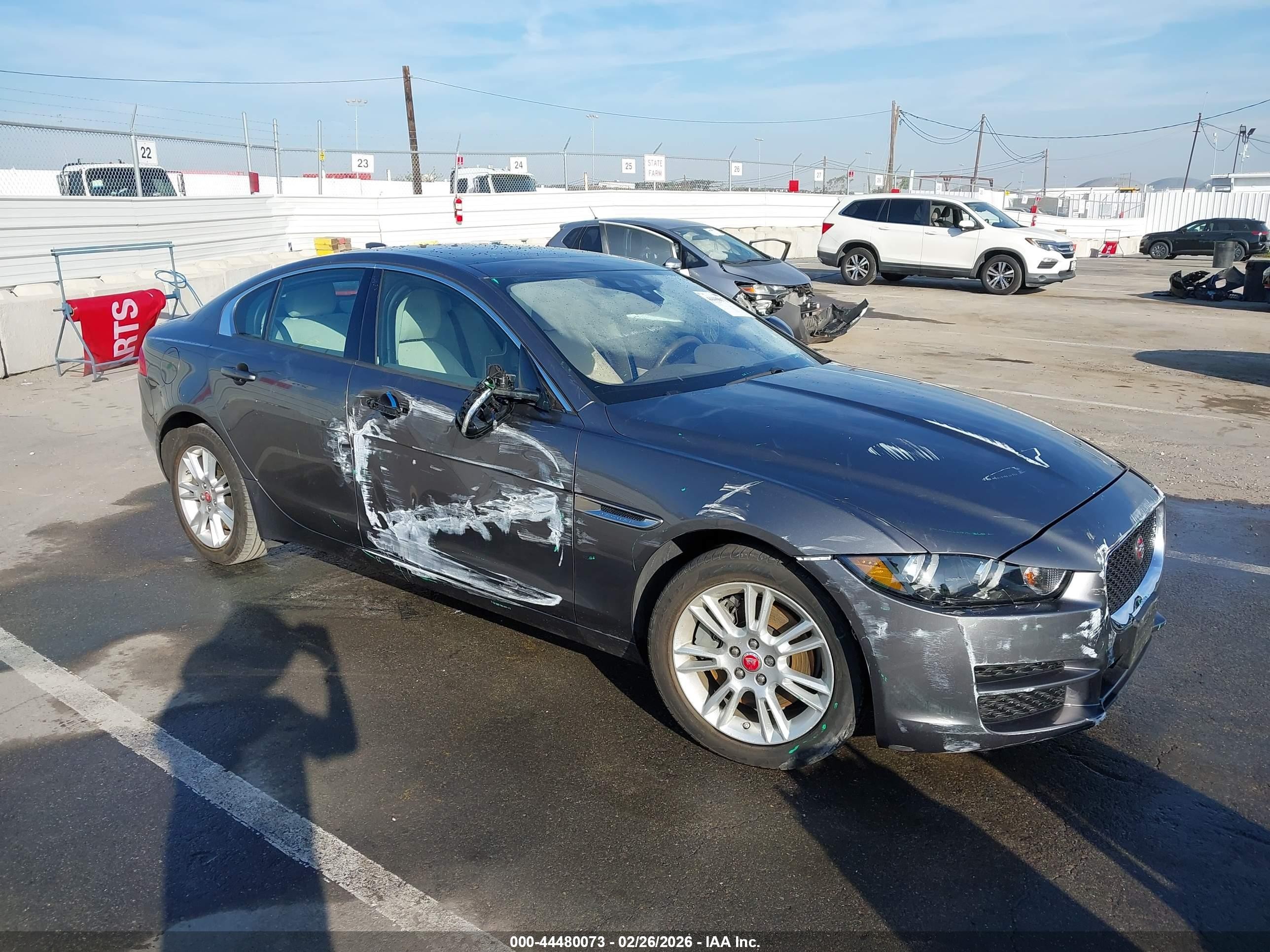 2017 Jaguar XE 25t Premium, VIN SAJAD4BG9HA949256 — Side