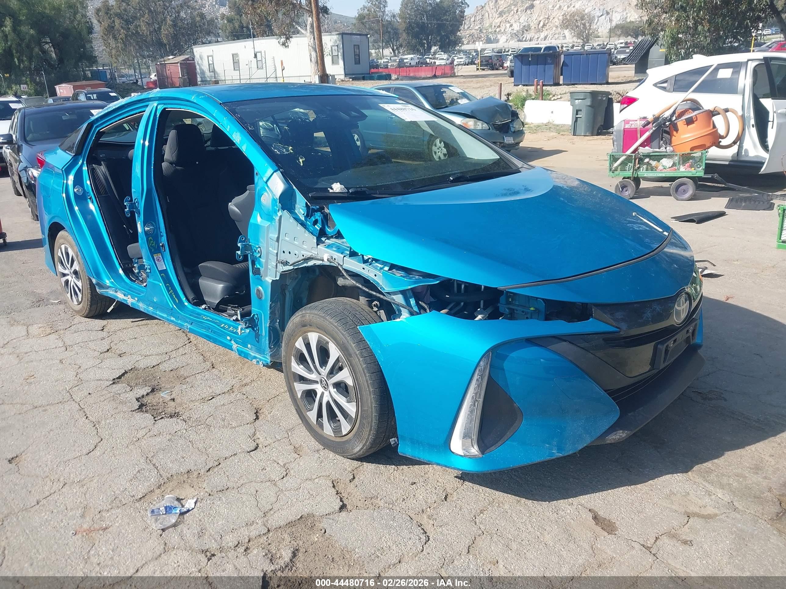 2021 Toyota Prius LE, VIN JTDKAMFPXM3176396 — Side