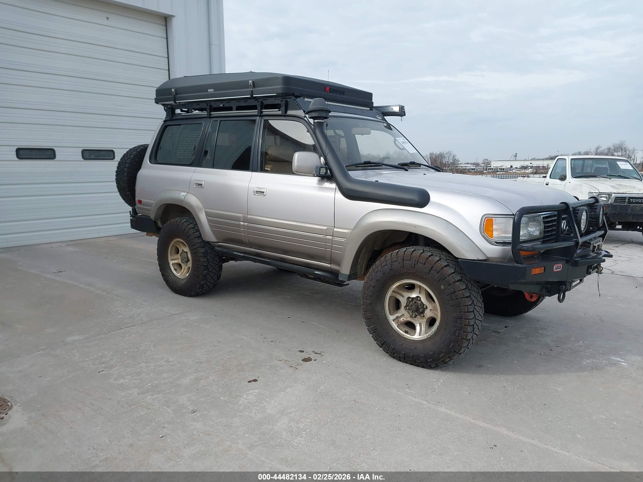 1997 Lexus LX 450, VIN JT6HJ88J5V0180621 — Side