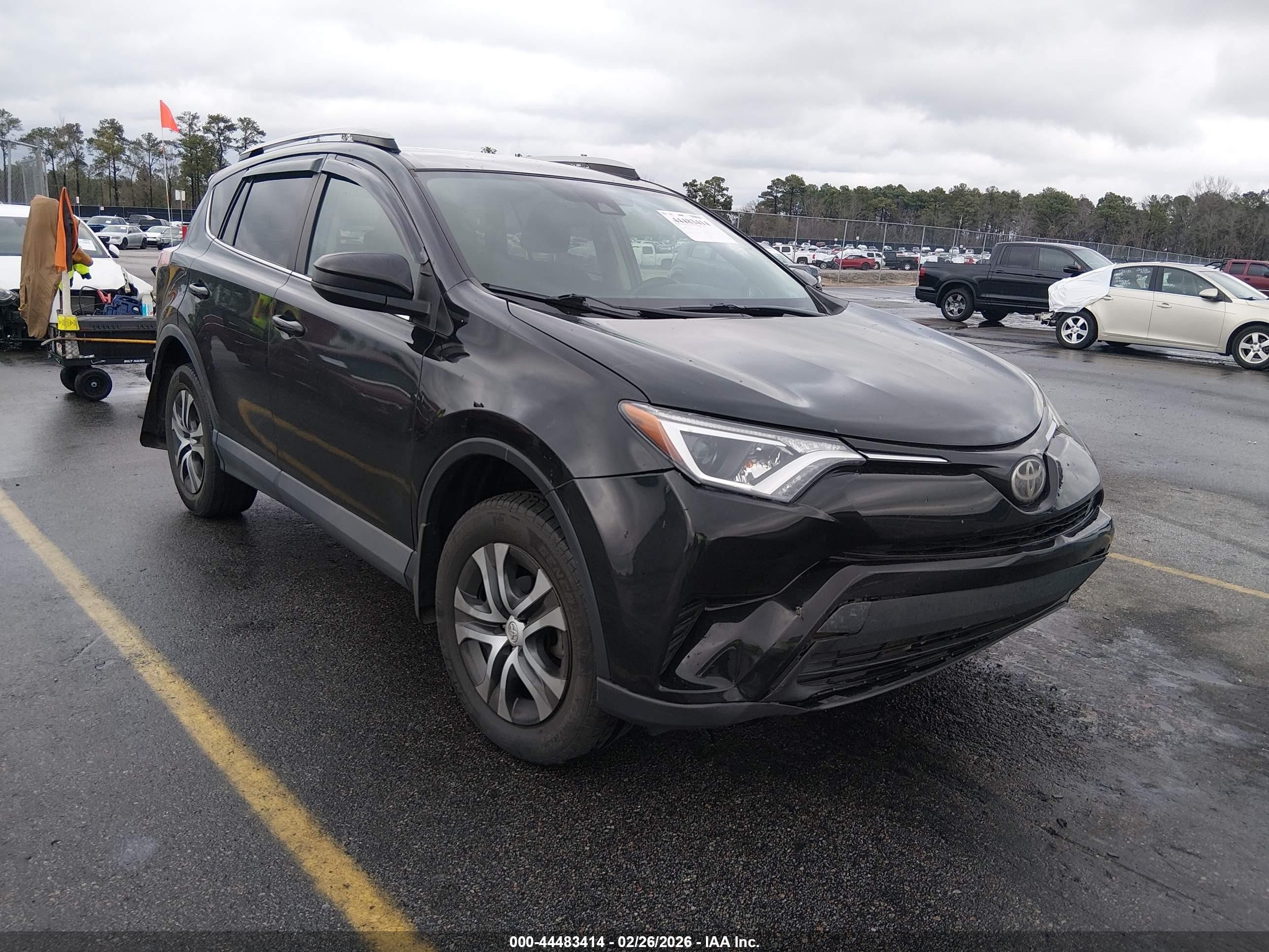 2018 Toyota RAV4 LE, VIN 2T3BFREV8JW715380 — Rear end