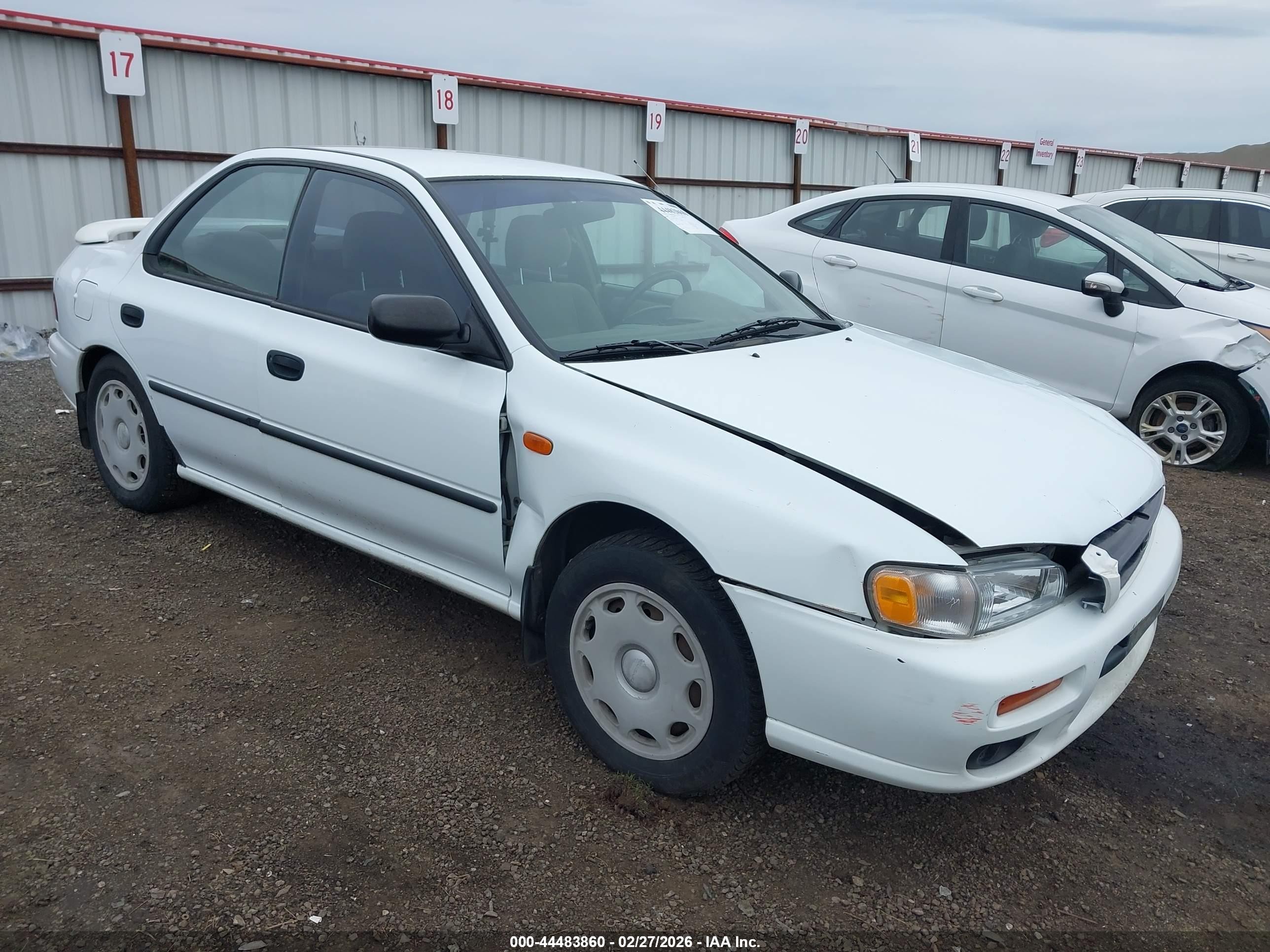2000 Subaru Impreza L, VIN JF1GC4354YH505031 — Side
