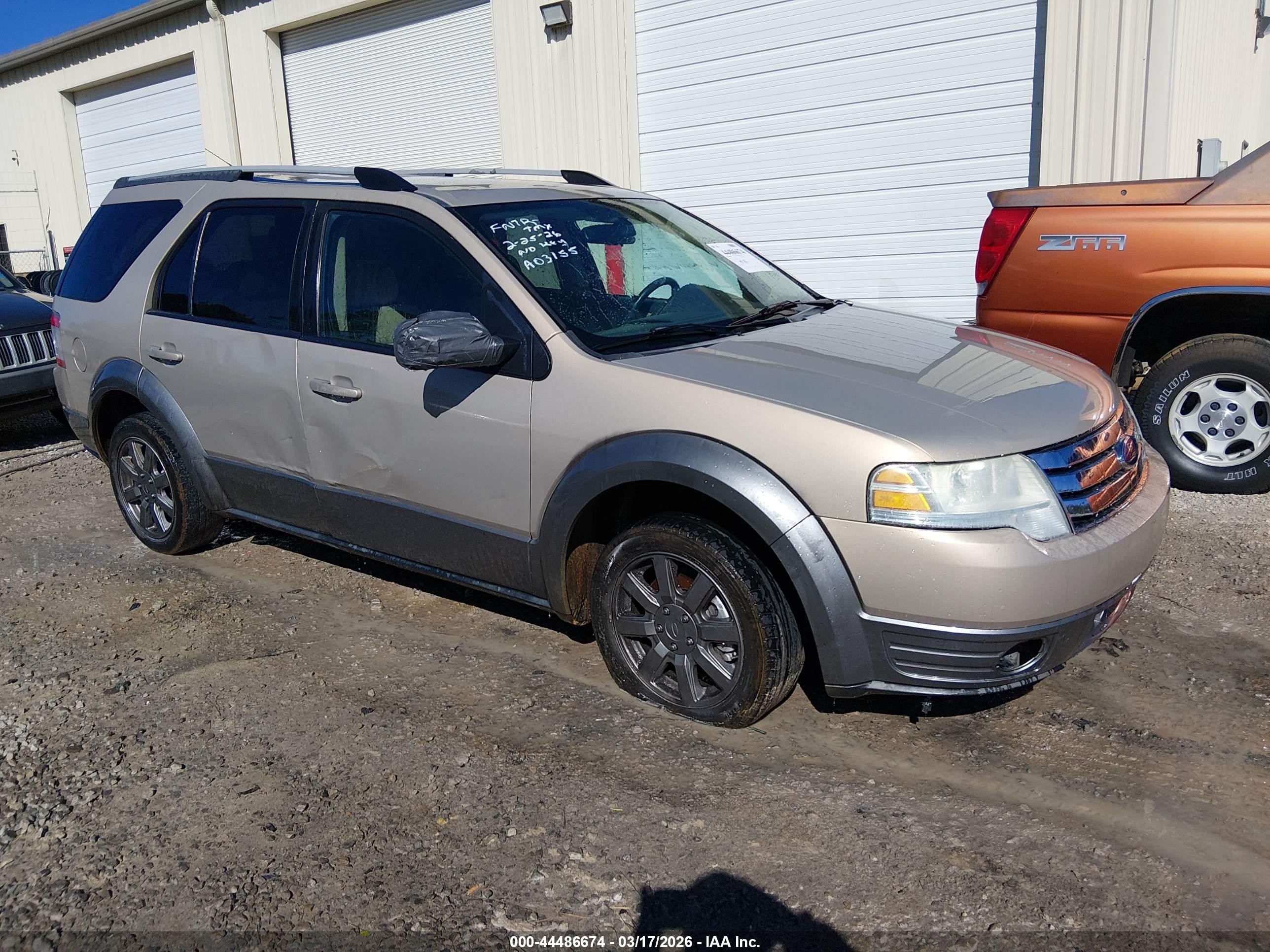 2008 Ford Taurus X SEL, VIN 1FMDK02W48GA03155 — Side