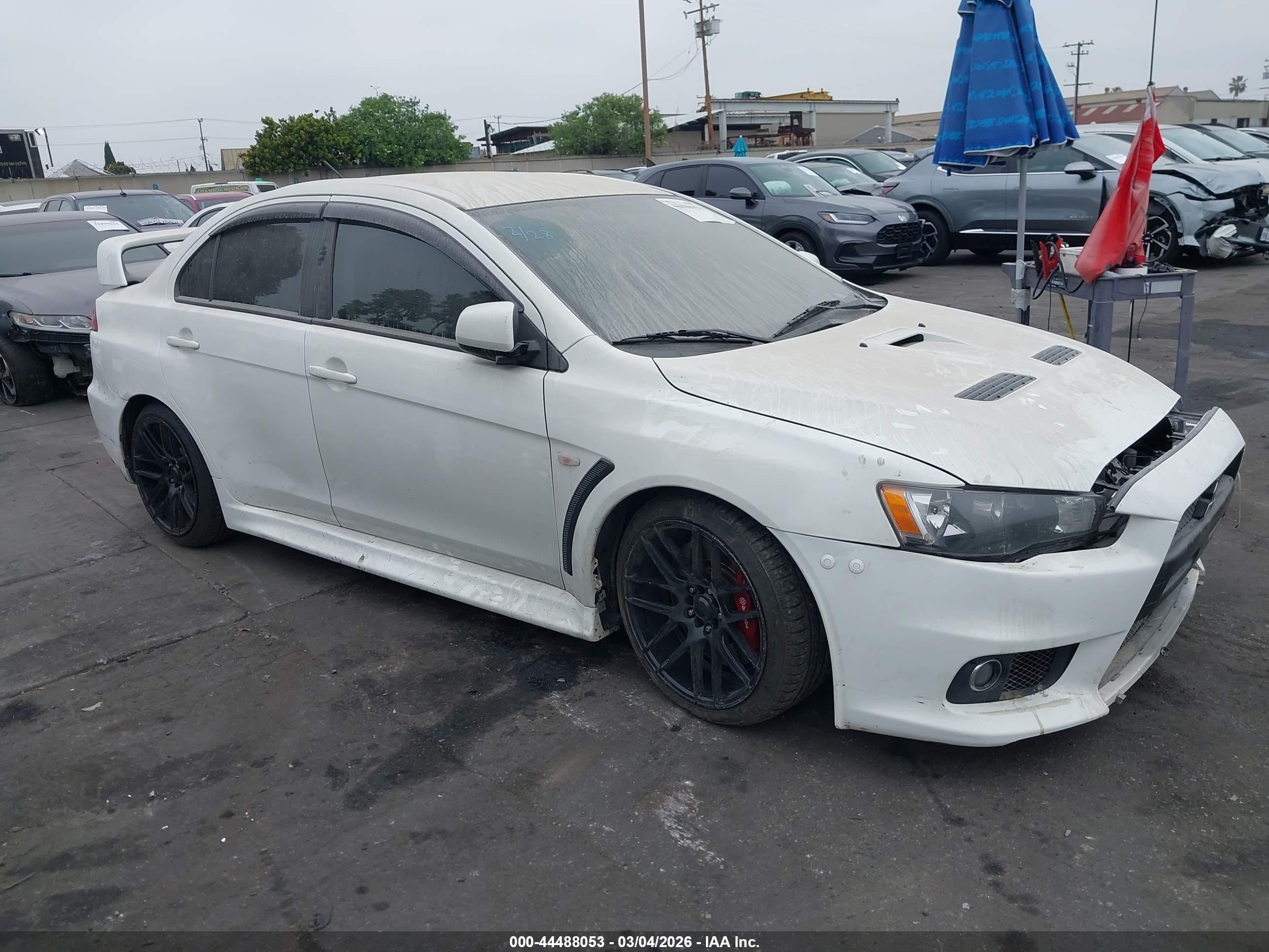 2014 Mitsubishi Lancer Evolution GSR, VIN JA32W8FV4EU016287 — Front end