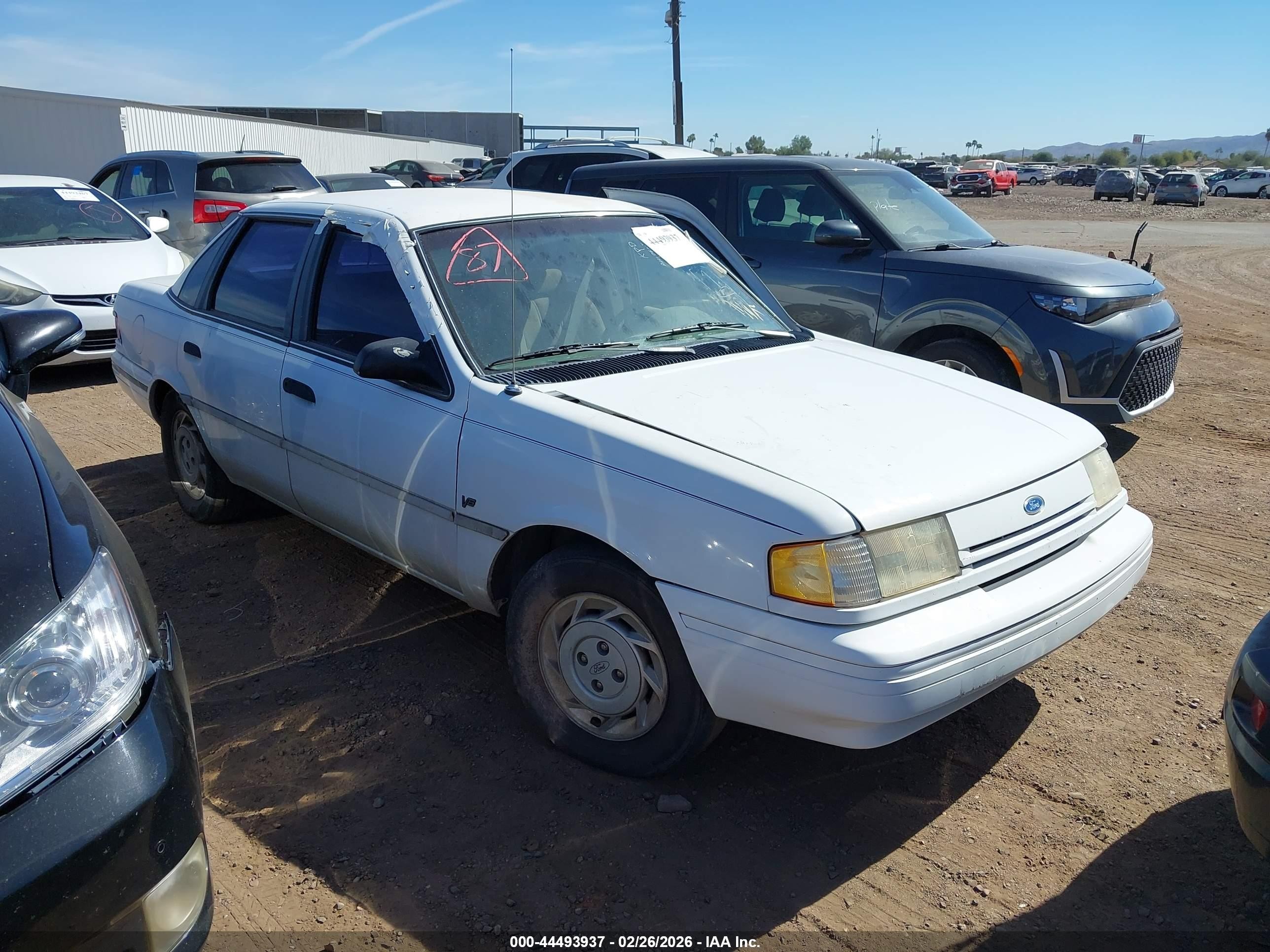1993 Ford Tempo, VIN 2FAPP36U5PB128805 — Side