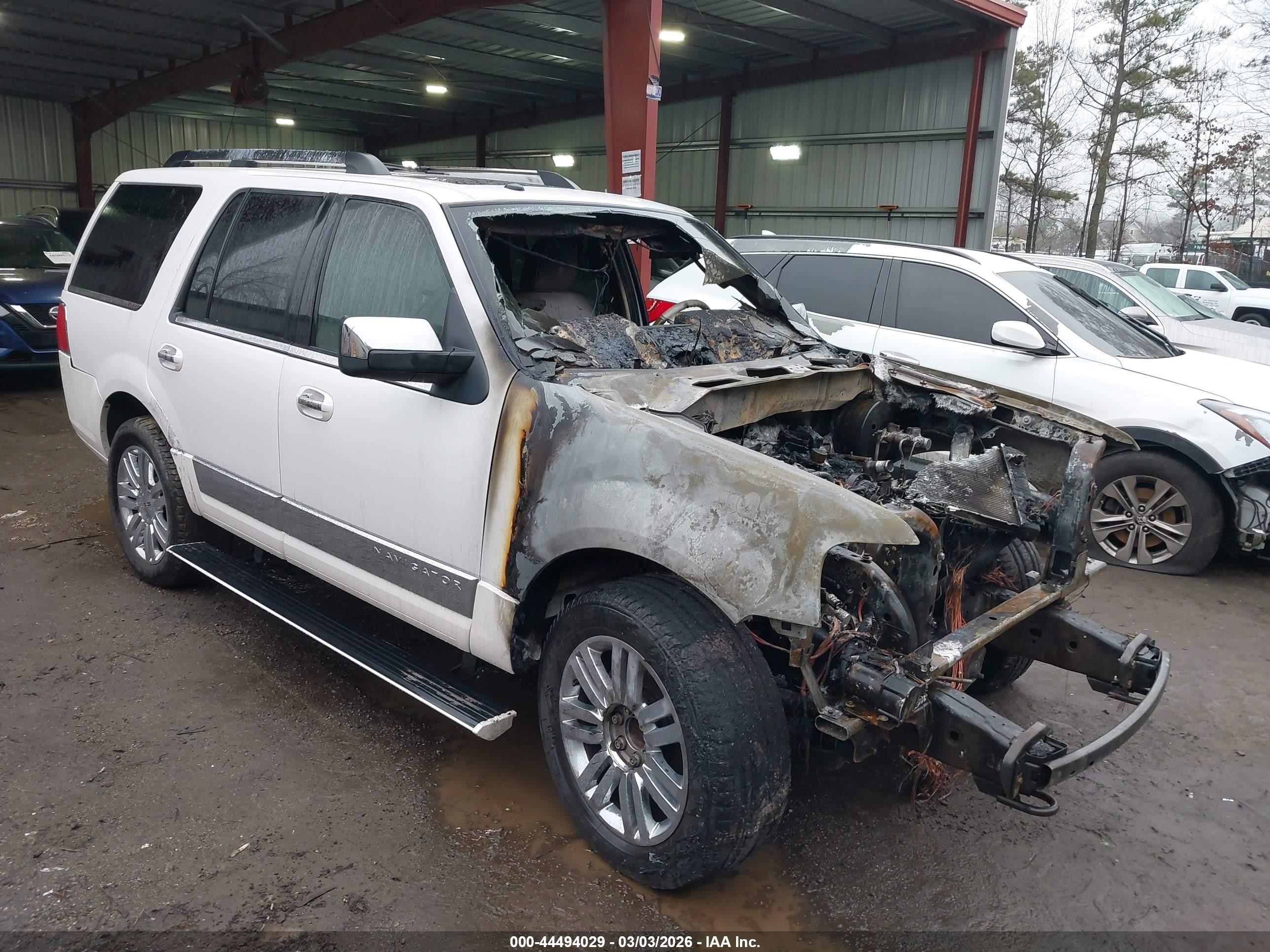 2010 Lincoln Navigator, VIN 5LMJJ2H51AEJ00554 — Engine fire