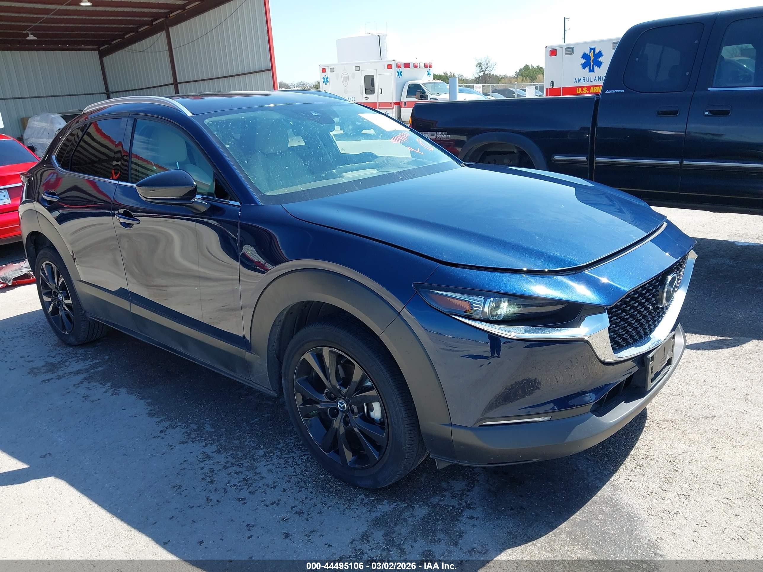 2022 Mazda CX-30 Premium, VIN 3MVDMBDYXNM459377 — Rear end