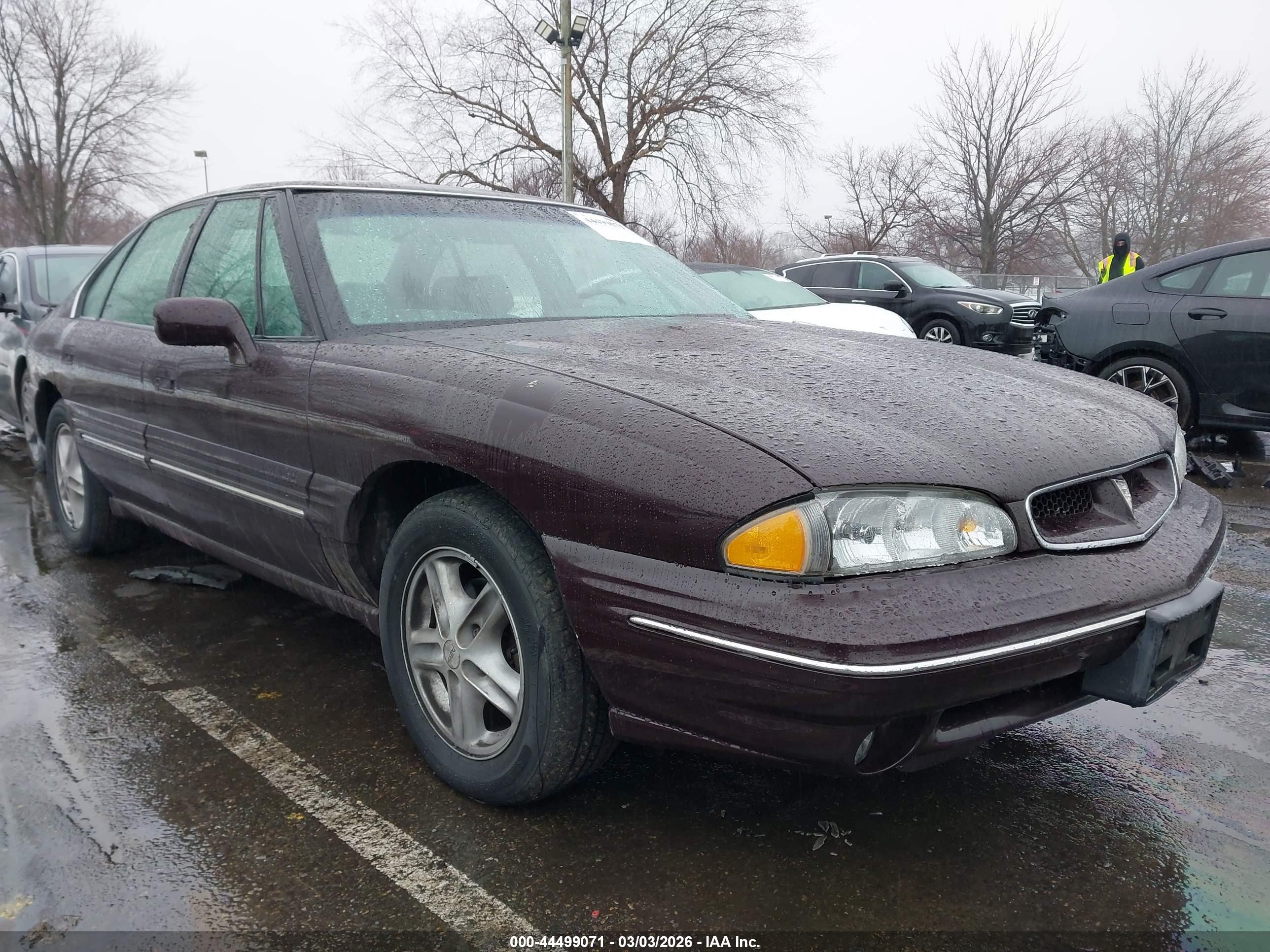 1999 Pontiac Bonneville SE, VIN 1G2HX52K3XH217956 — Side