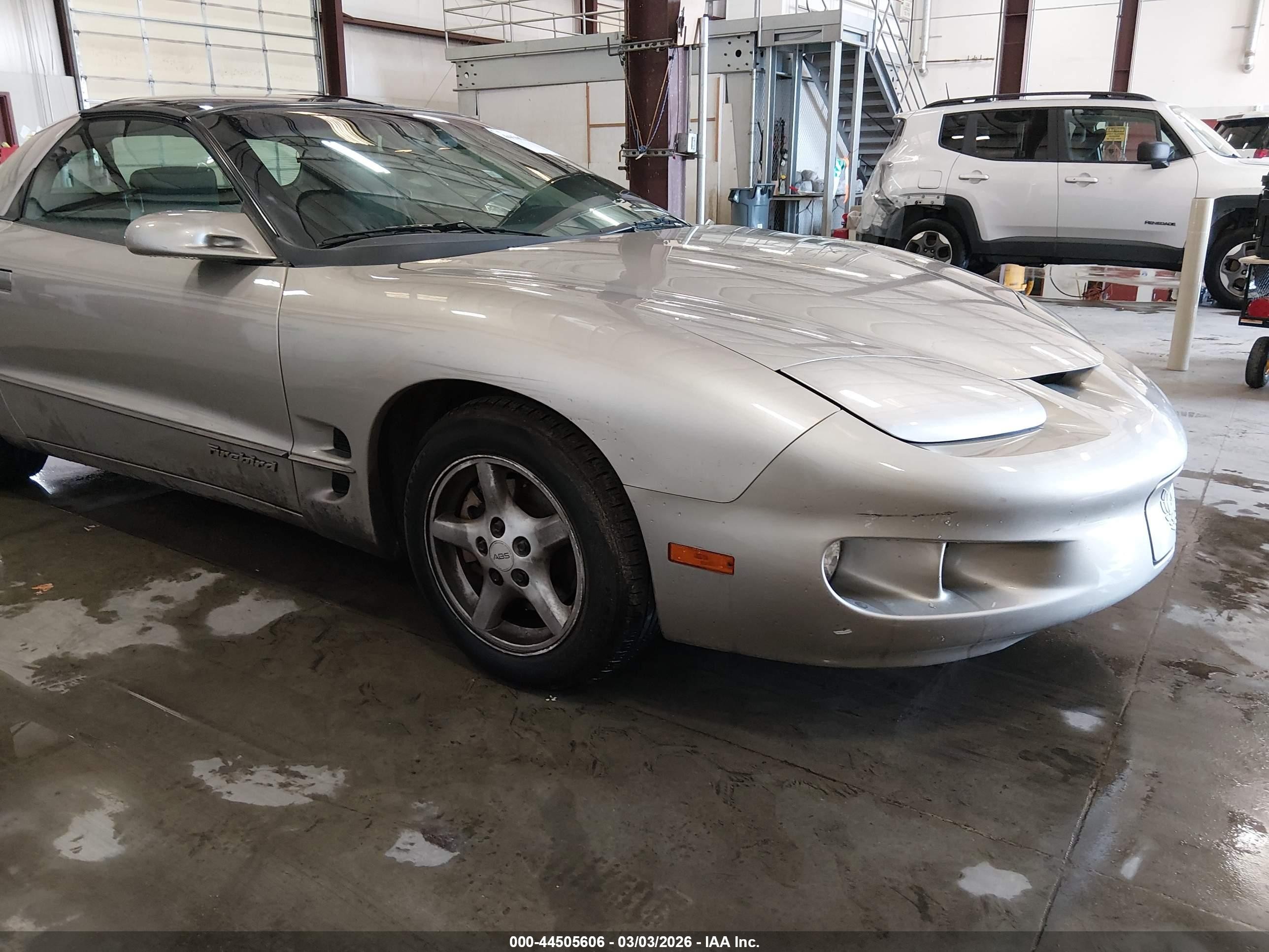 1999 Pontiac Firebird Firebird, VIN 2G2FS22K5X2207463 — Side