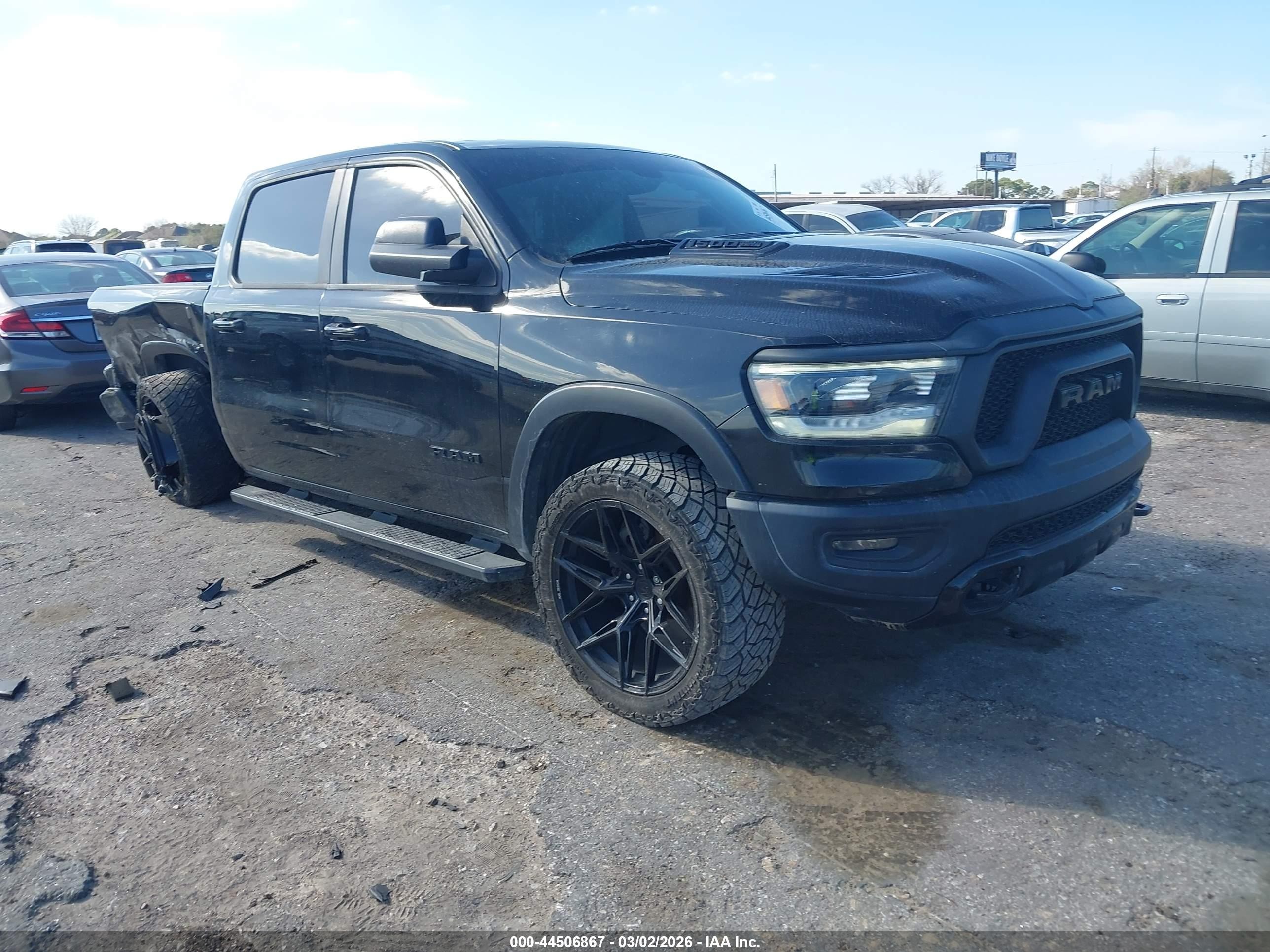 2020 Ram 1500 Rebel, VIN 1C6RRELT2LN191399 — Side