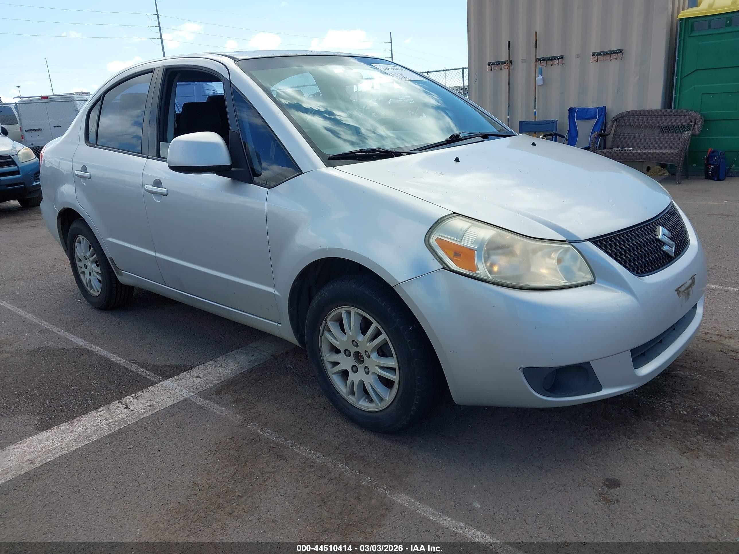 2012 Suzuki SX4 LE, VIN JS2YC5A30C6305764 — Rear end