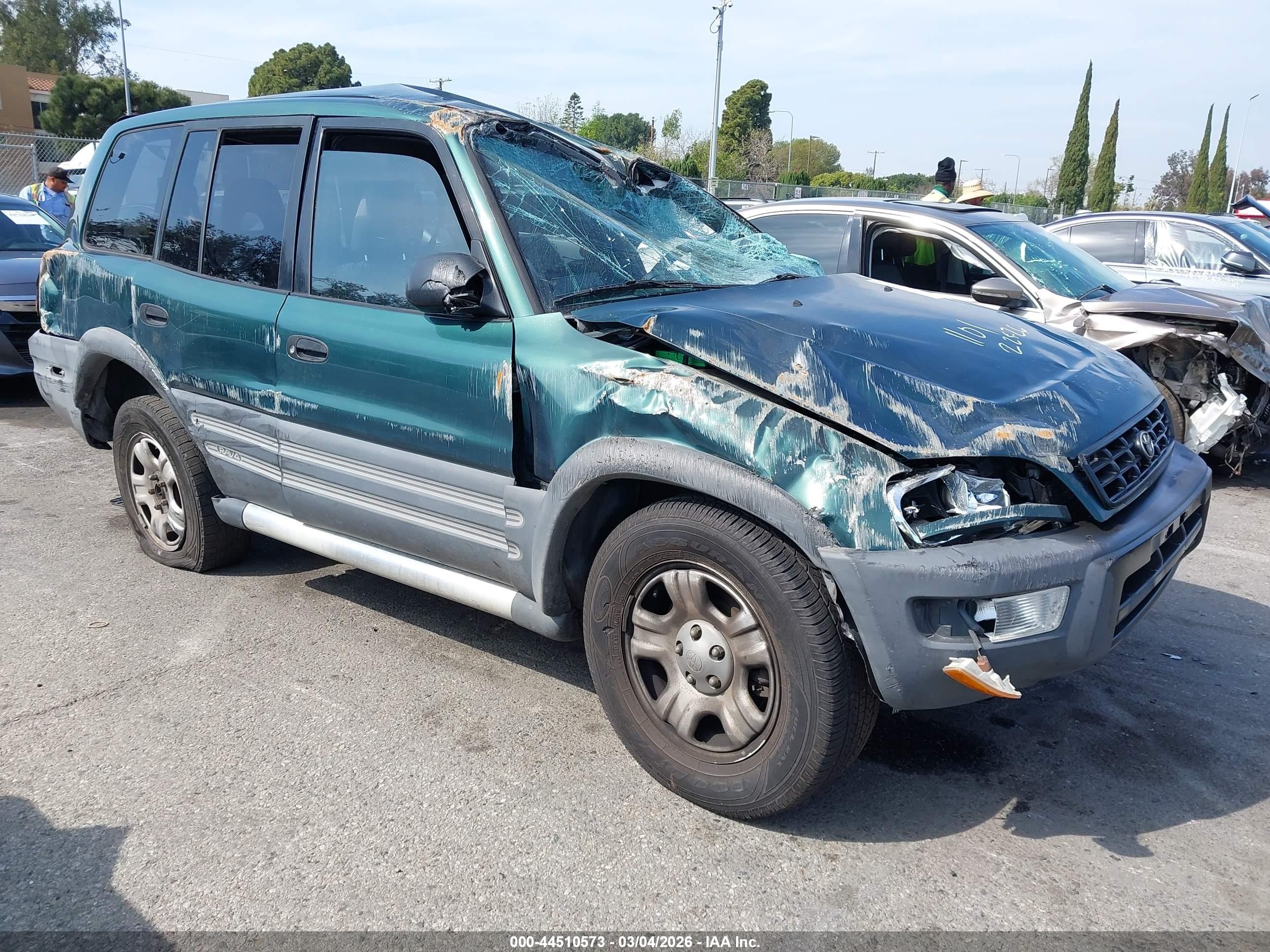 1998 Toyota RAV4, VIN JT3GP10V9W7037631 — Rollover