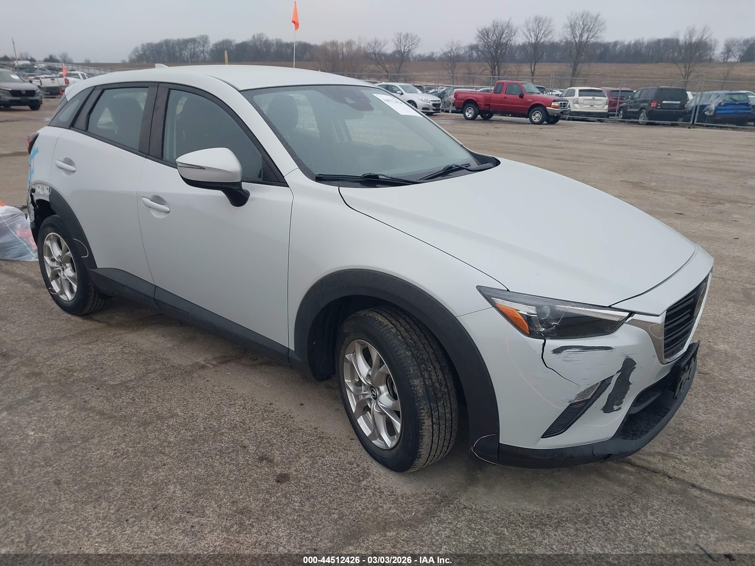 2019 Mazda CX-3 Sport, VIN JM1DKFB73K1459593 — Side