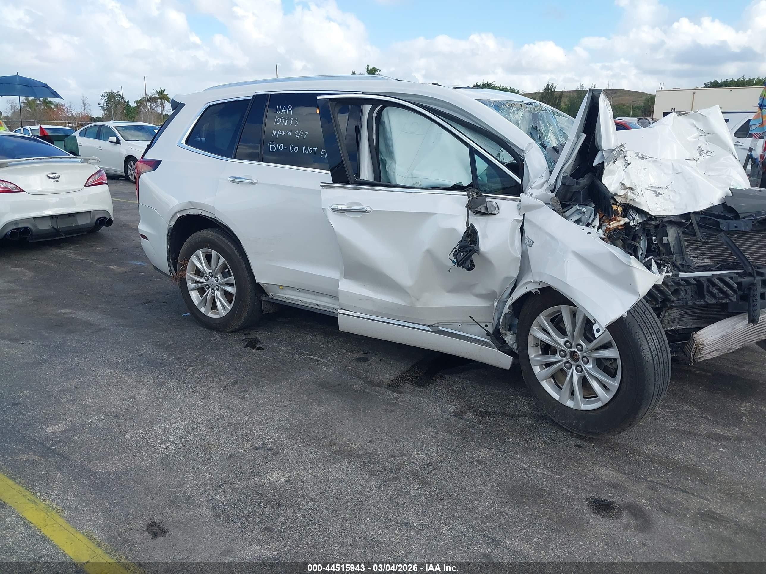 2023 Cadillac XT6 FWD Luxury, VIN 1GYKPAR49PZ109833 — Biohazard / chemical