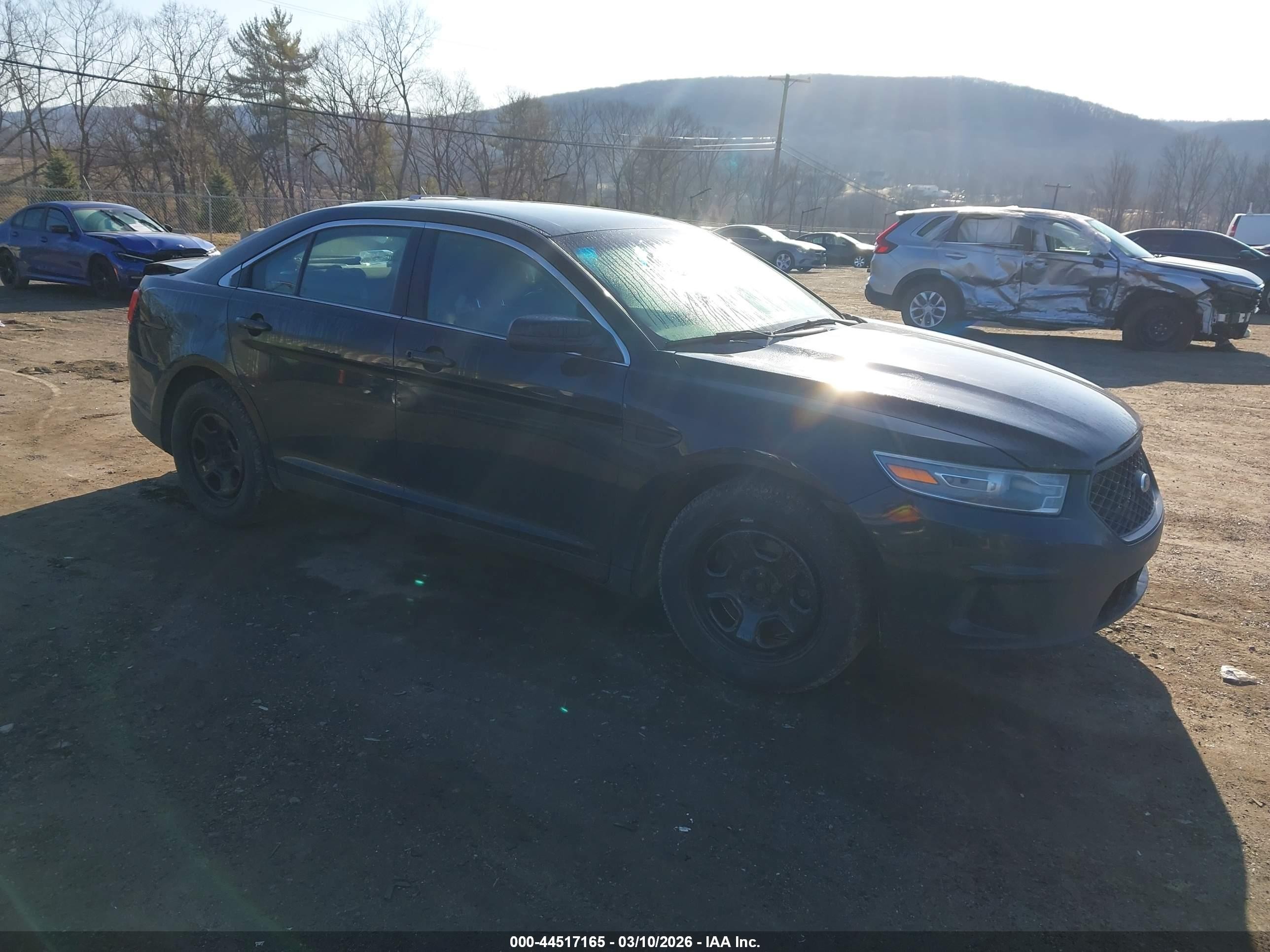 2013 Ford Police Interceptor, VIN 1FAHP2MKXDG227060 — Rear end