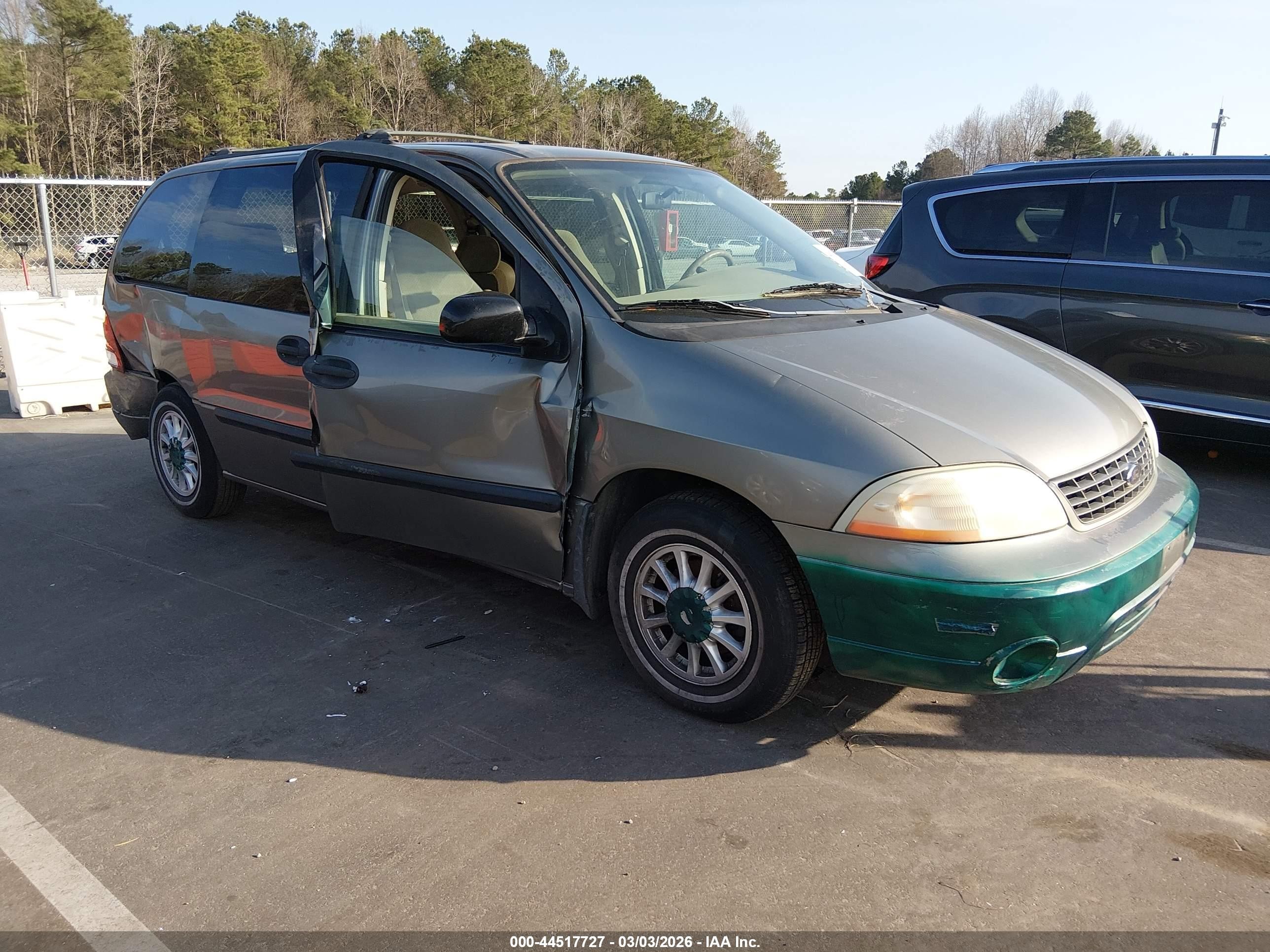 2003 Ford Windstar LX, VIN 2FMZA51423BA97722 — Side