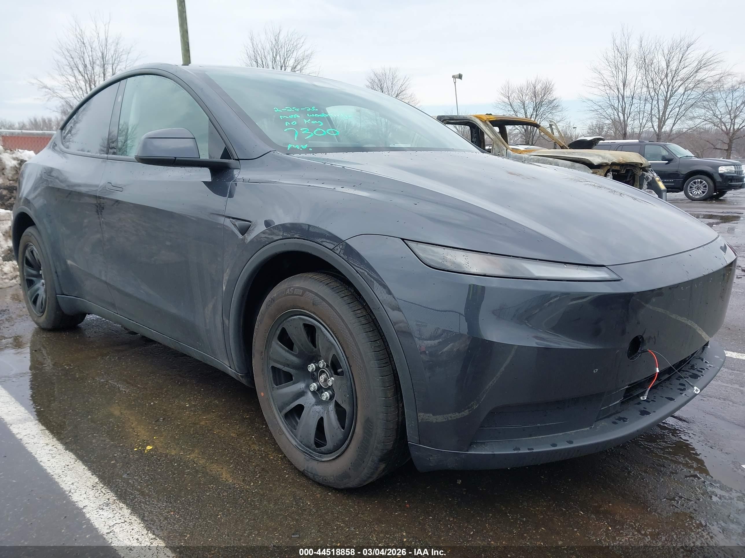 2026 Tesla Model Y Long Range Launch Series, VIN 7SAYGDEE6TA637300 — Фото с аукциона