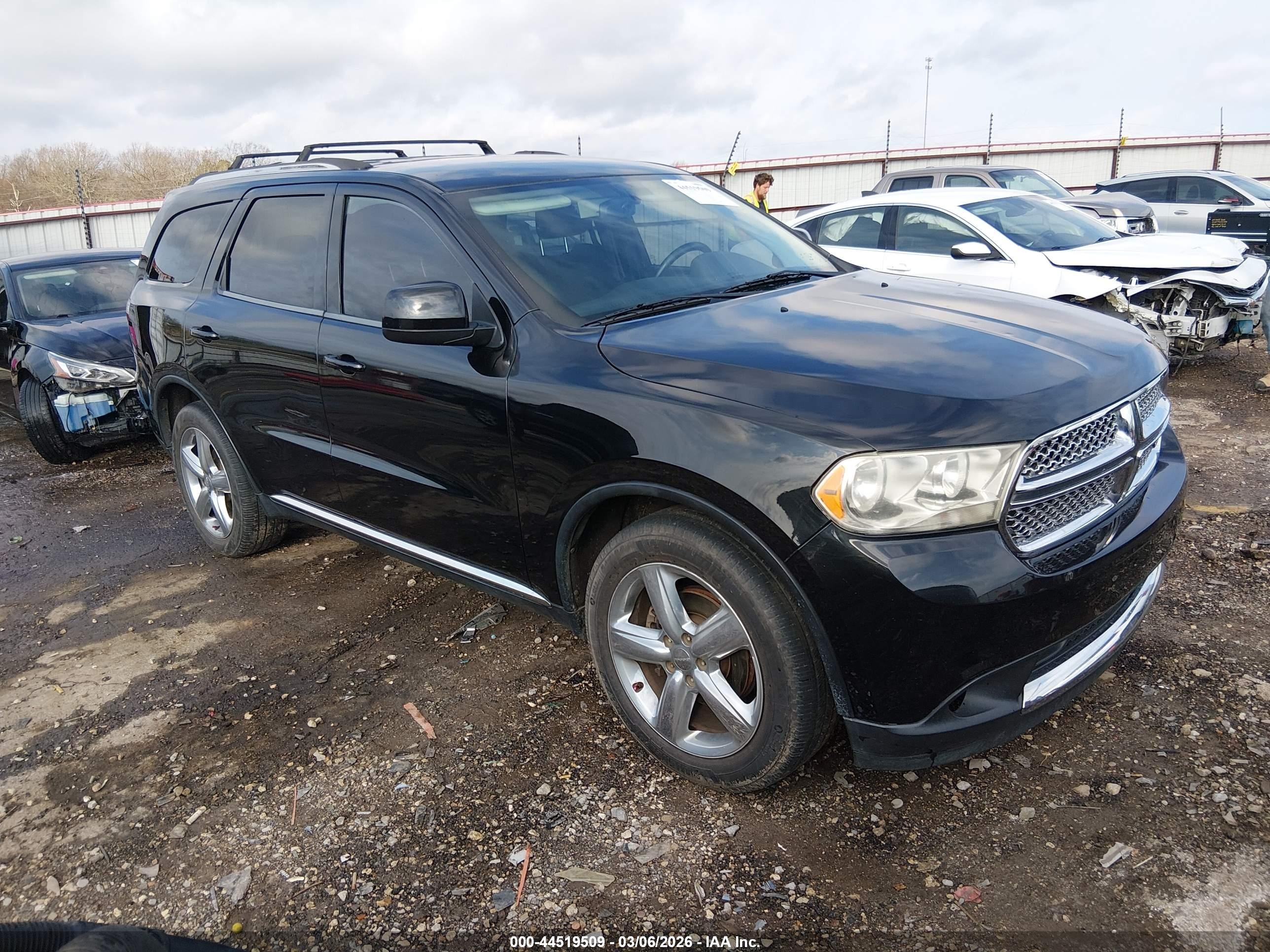 2013 Dodge Durango SXT, VIN 1C4RDJAG5DC699207 — Side