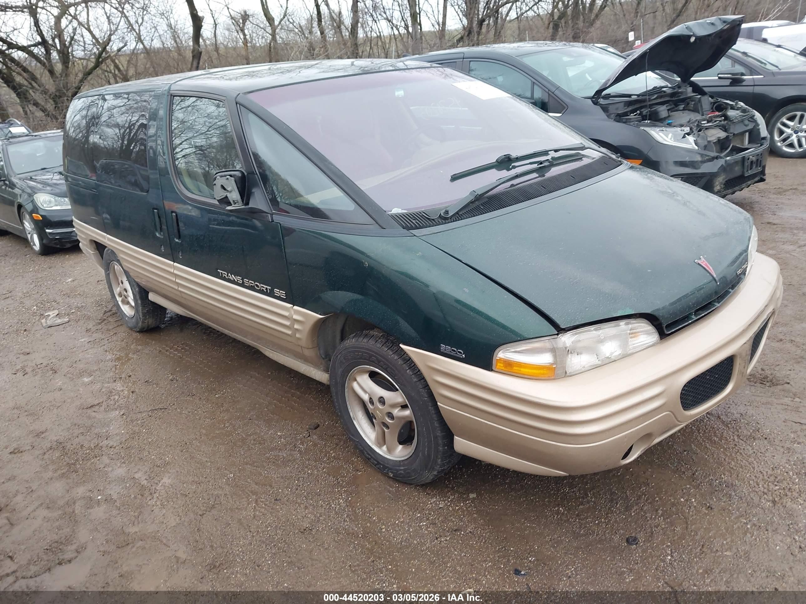 1994 Pontiac Trans Sport, VIN 1GMDU06L4RT240375 — Side