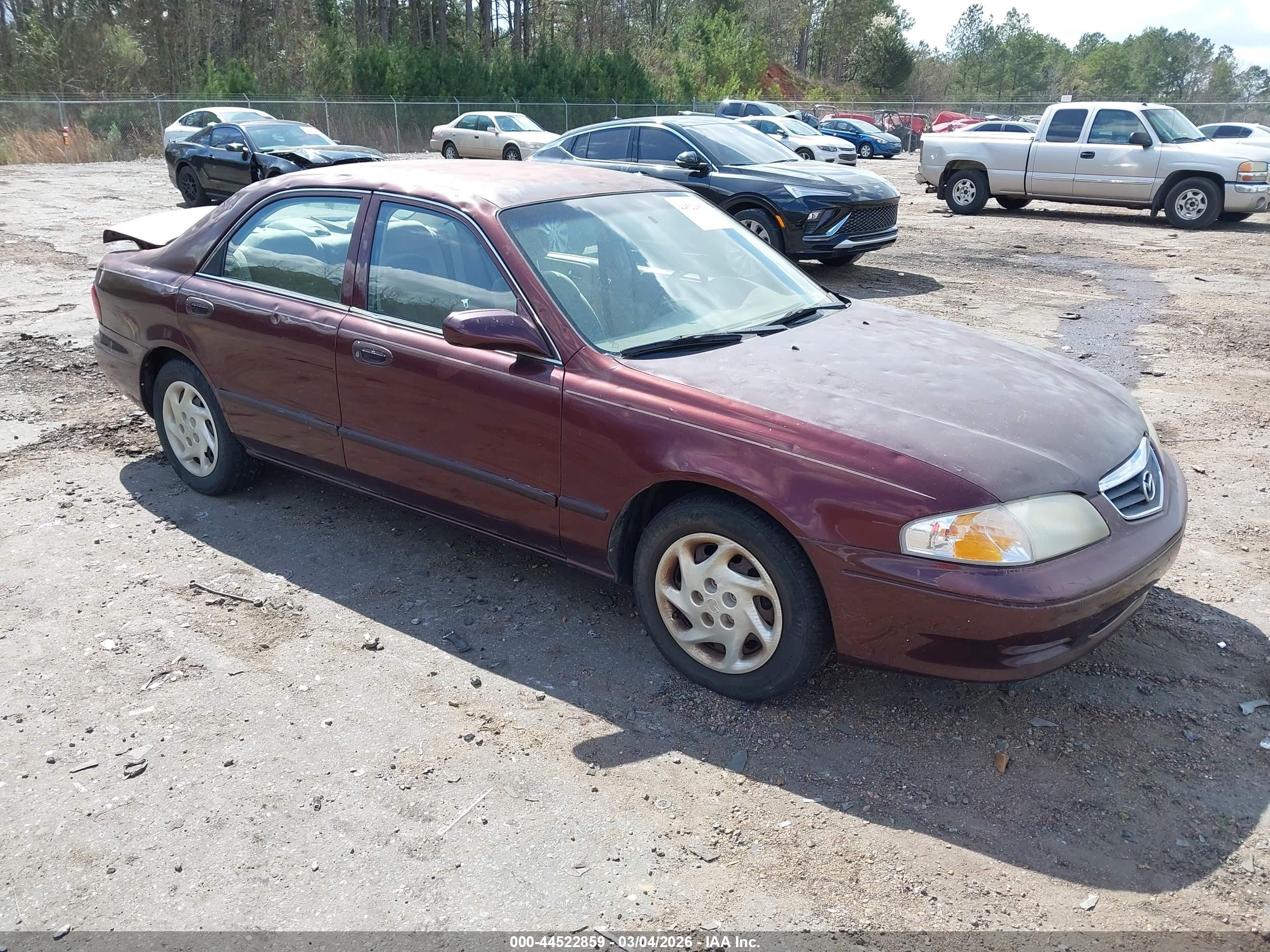 2001 Mazda 626 LX, VIN 1YVGF22C715220847 — Auction photo