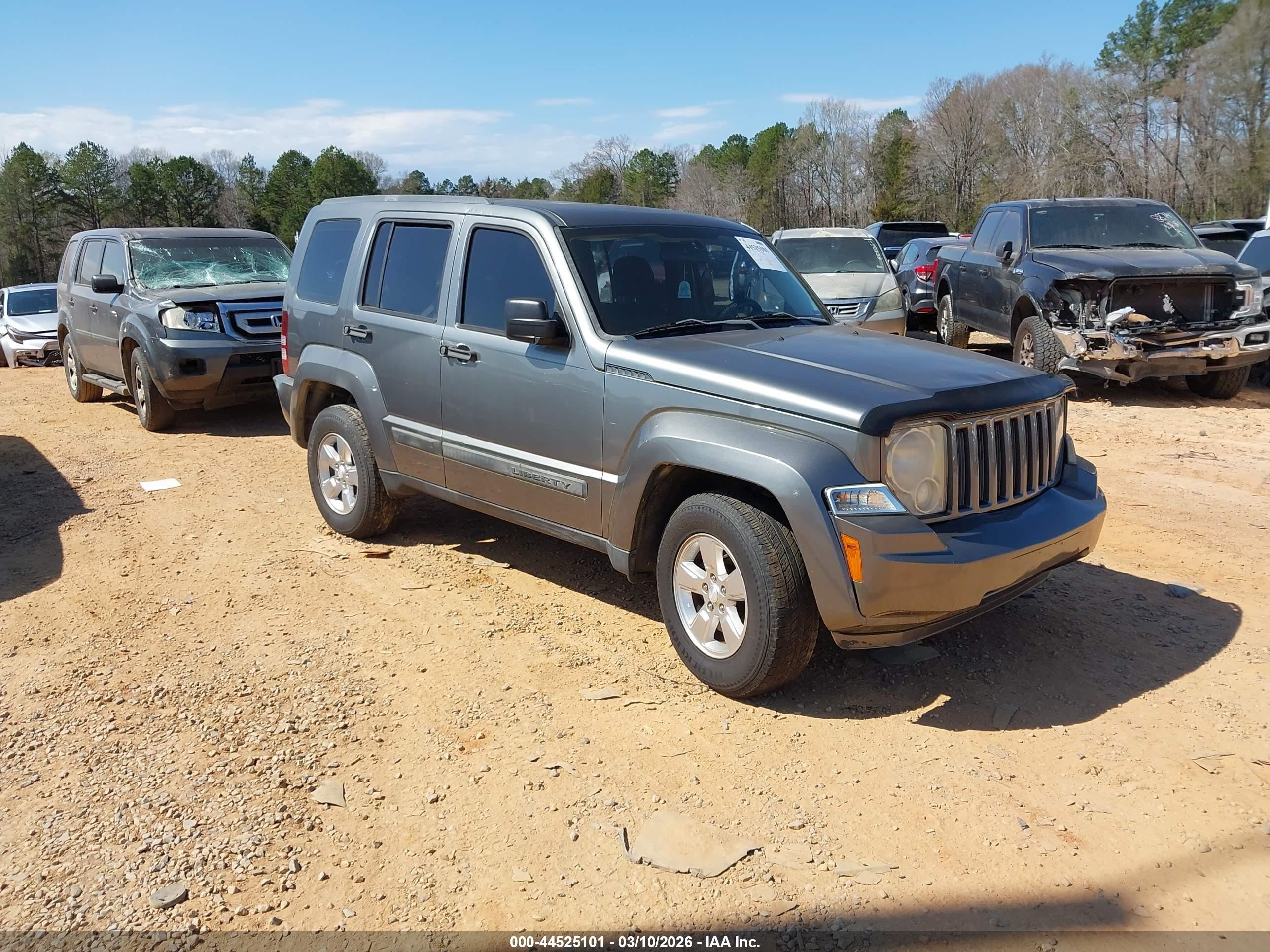 2012 Jeep Liberty Sport, VIN 1C4PJMAK2CW183647 — Бок