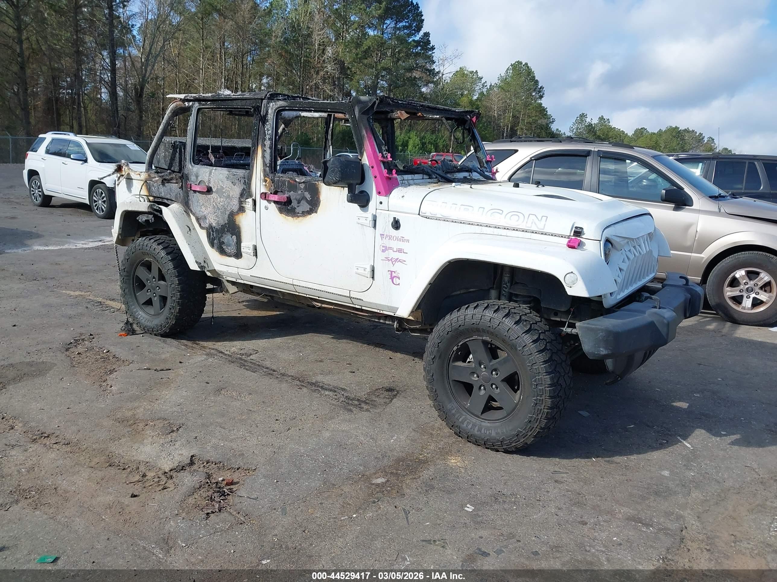 2016 Jeep Wrangler Unlimited Rubicon Hard Rock, VIN 1C4BJWFG2GL252693 — Interior fire