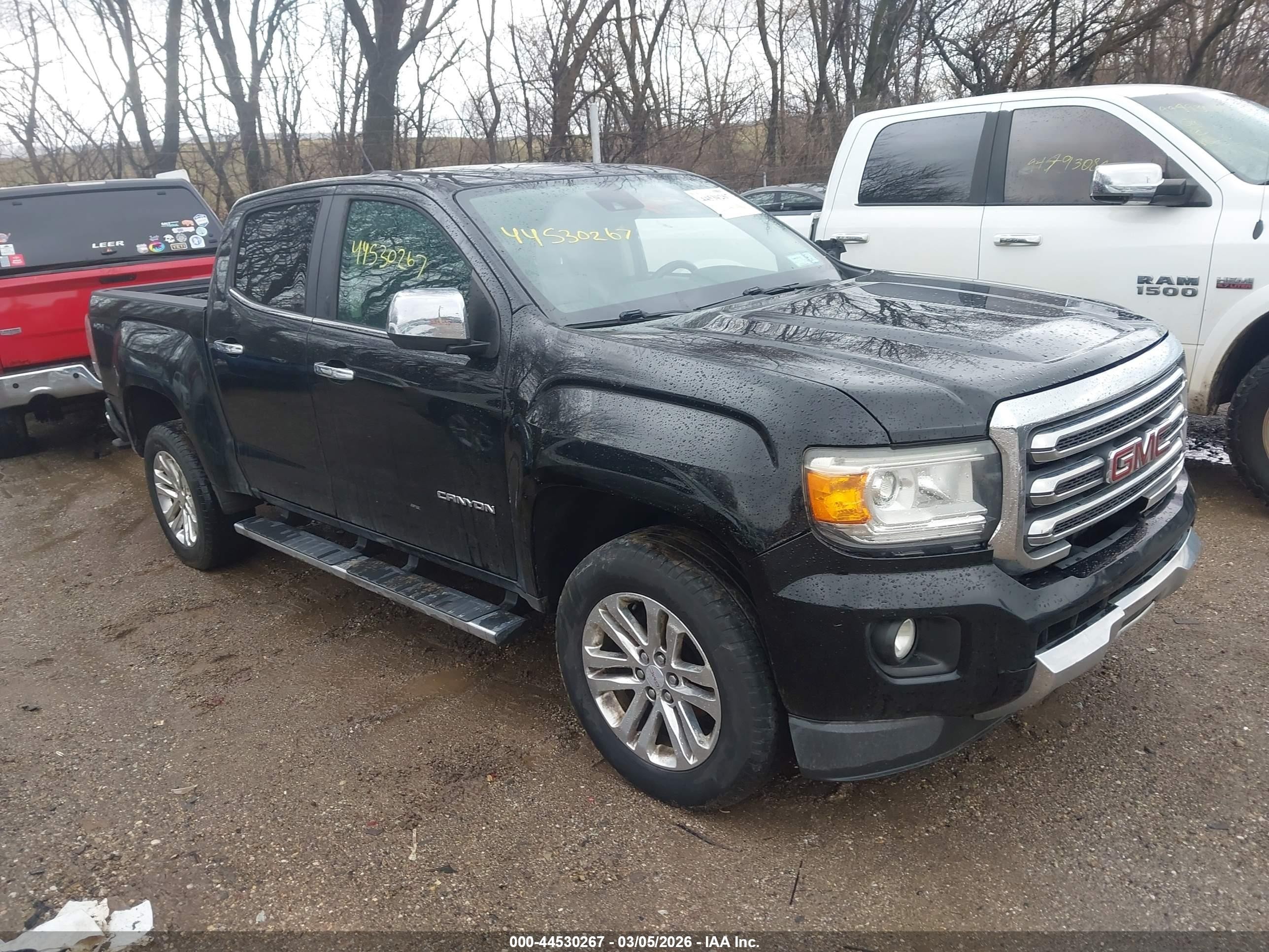 2015 GMC Canyon 4WD SLT, VIN 1GTG6CE32F1267810 — Side
