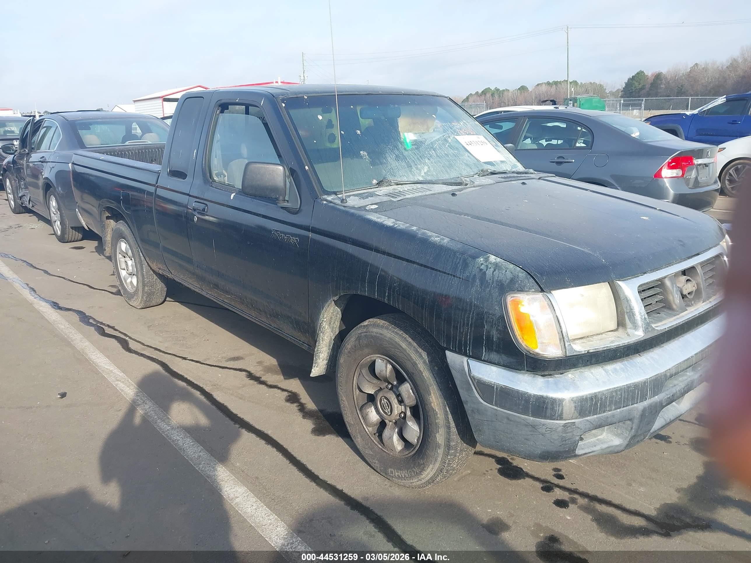 1999 Nissan Frontier XE, VIN 1N6DD26S1XC305877 — Engine fire