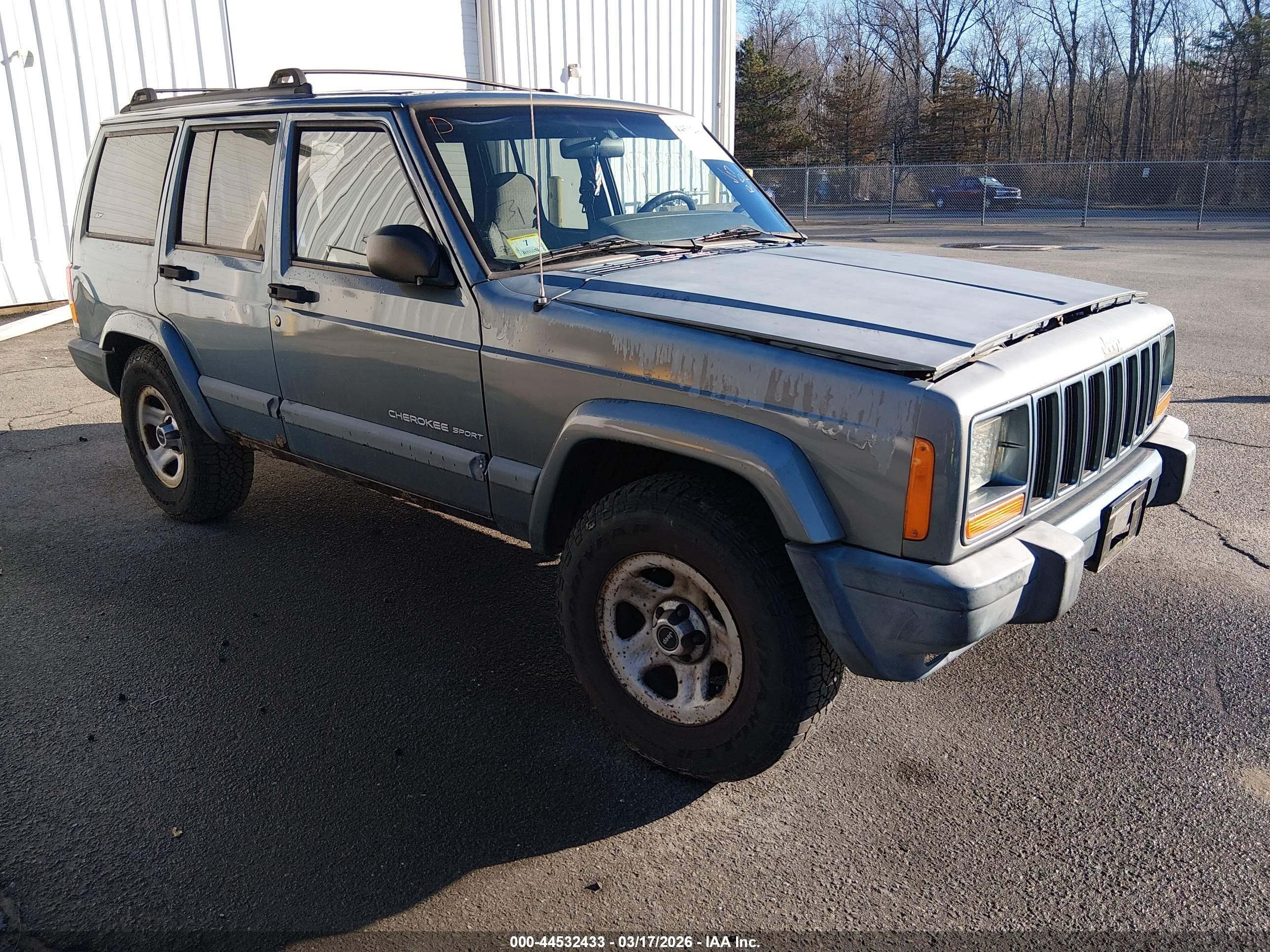 1999 Jeep Cherokee Sport, VIN 1J4FF68S3XL651689 — Side