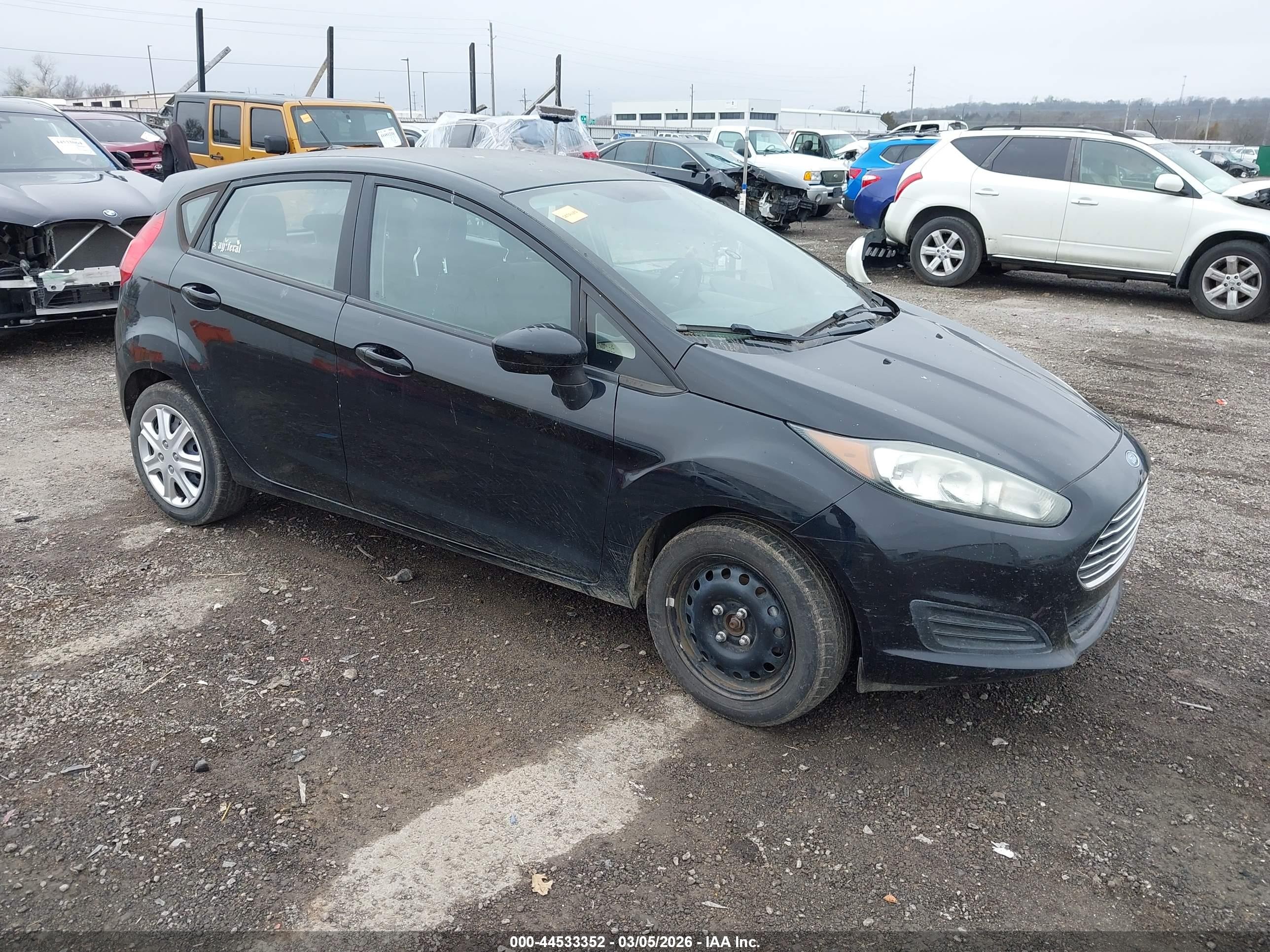 2017 Ford Fiesta S, VIN 3FADP4TJ9HM169263 — Side