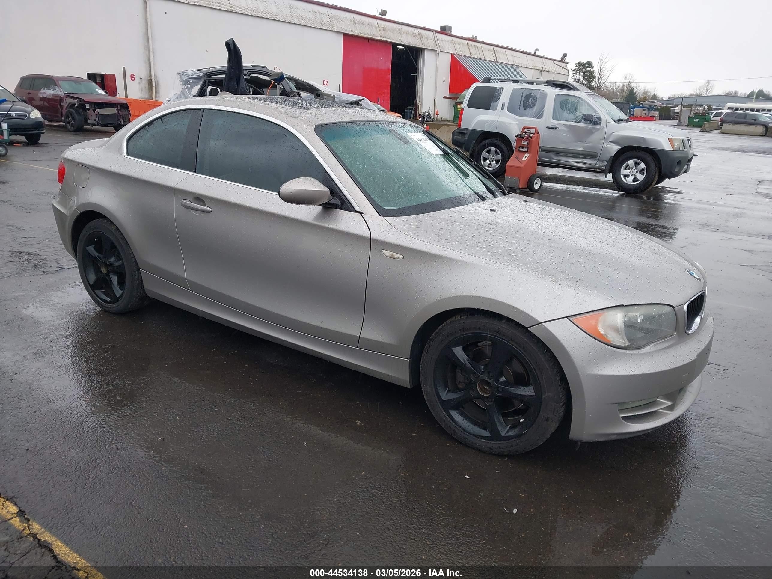 2009 BMW 1 Series 128i, VIN WBAUP93599VF49303 — Front end