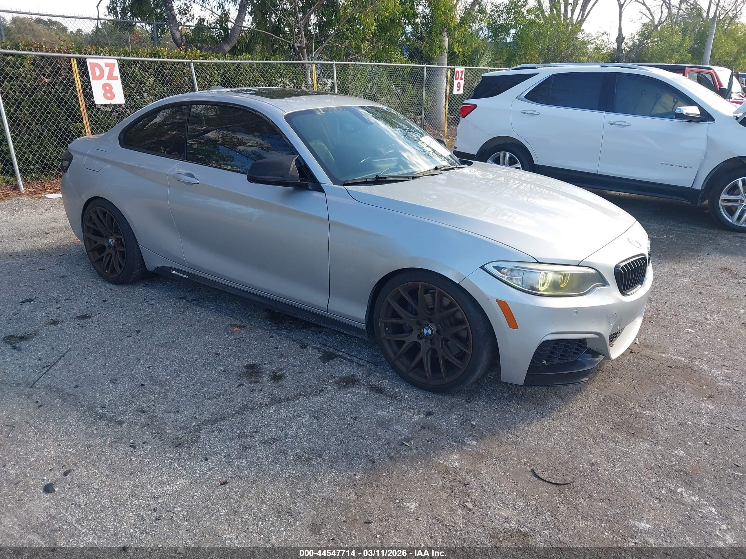 2015 BMW 2 Series M235i, VIN WBA1J7C59FV358577 — Rear end