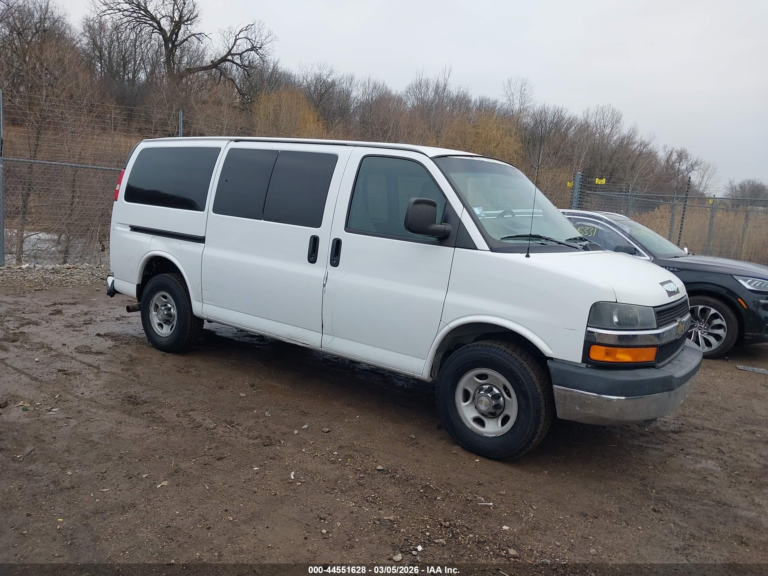 2013 Chevrolet Express Passenger 1LT, VIN 1GAZGYFG0D1182927 — Rear end