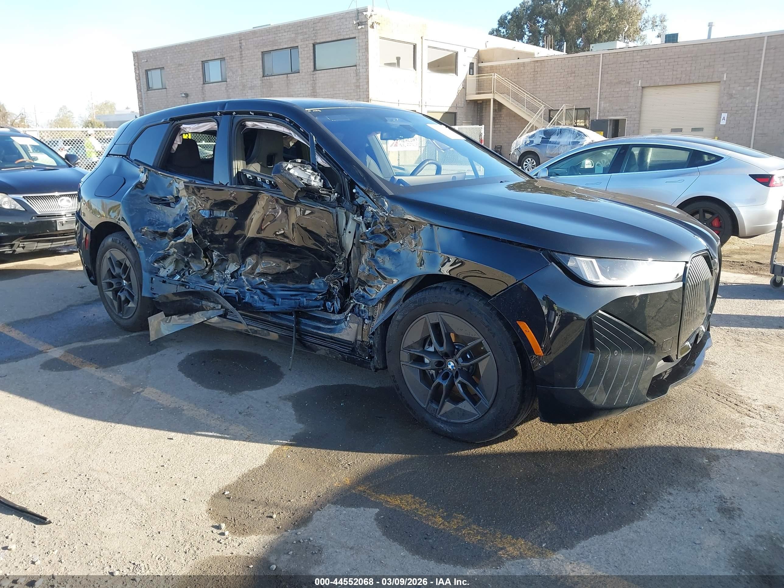 2026 BMW iX xDrive45, VIN WB543CF09TCV01873 — Side