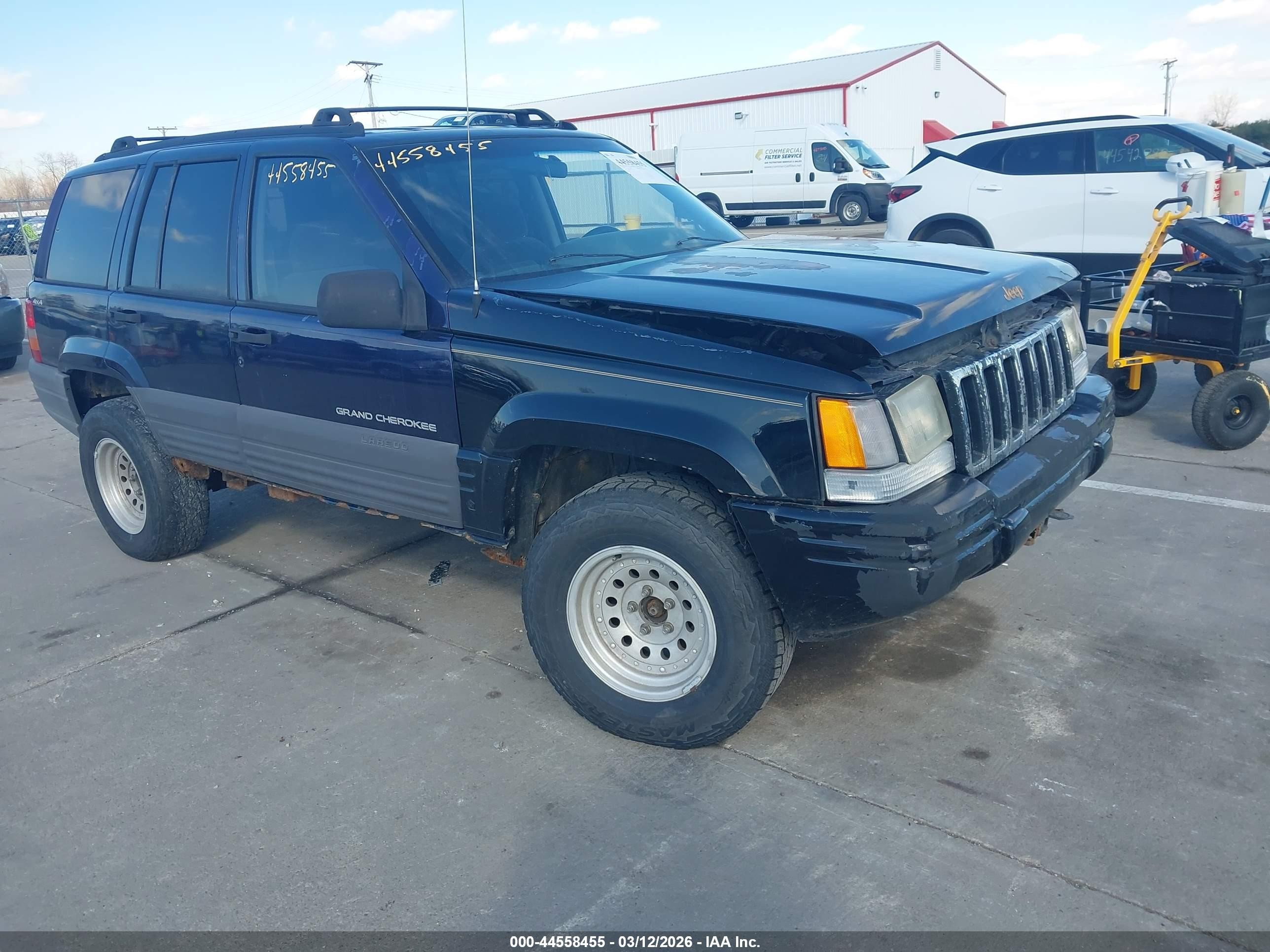 1997 Jeep Grand Cherokee Laredo, VIN 1J4GZ58S6VC728512 — Side