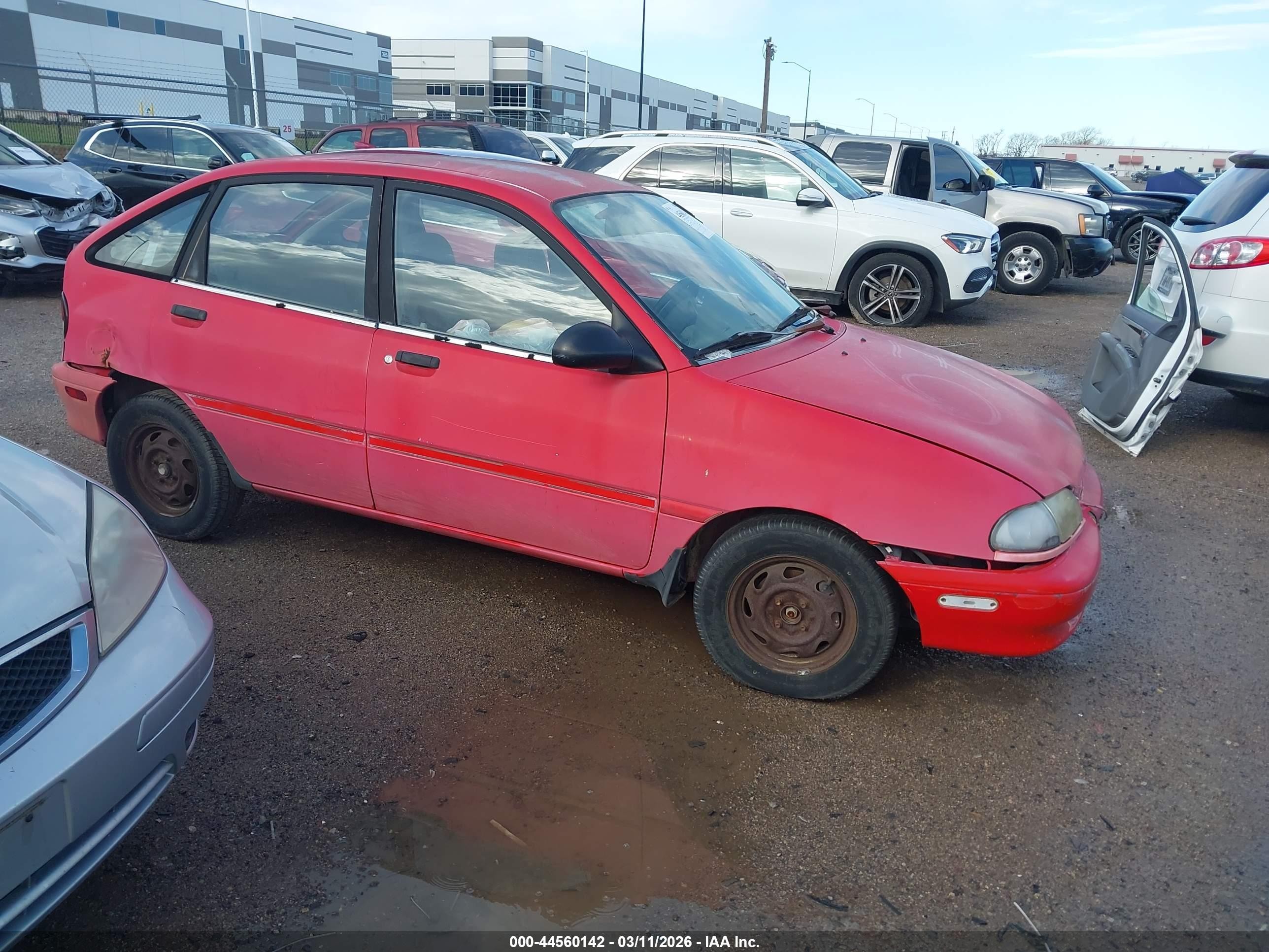 1995 Ford Aspire, VIN KNJLT06H5S6133870 — Side