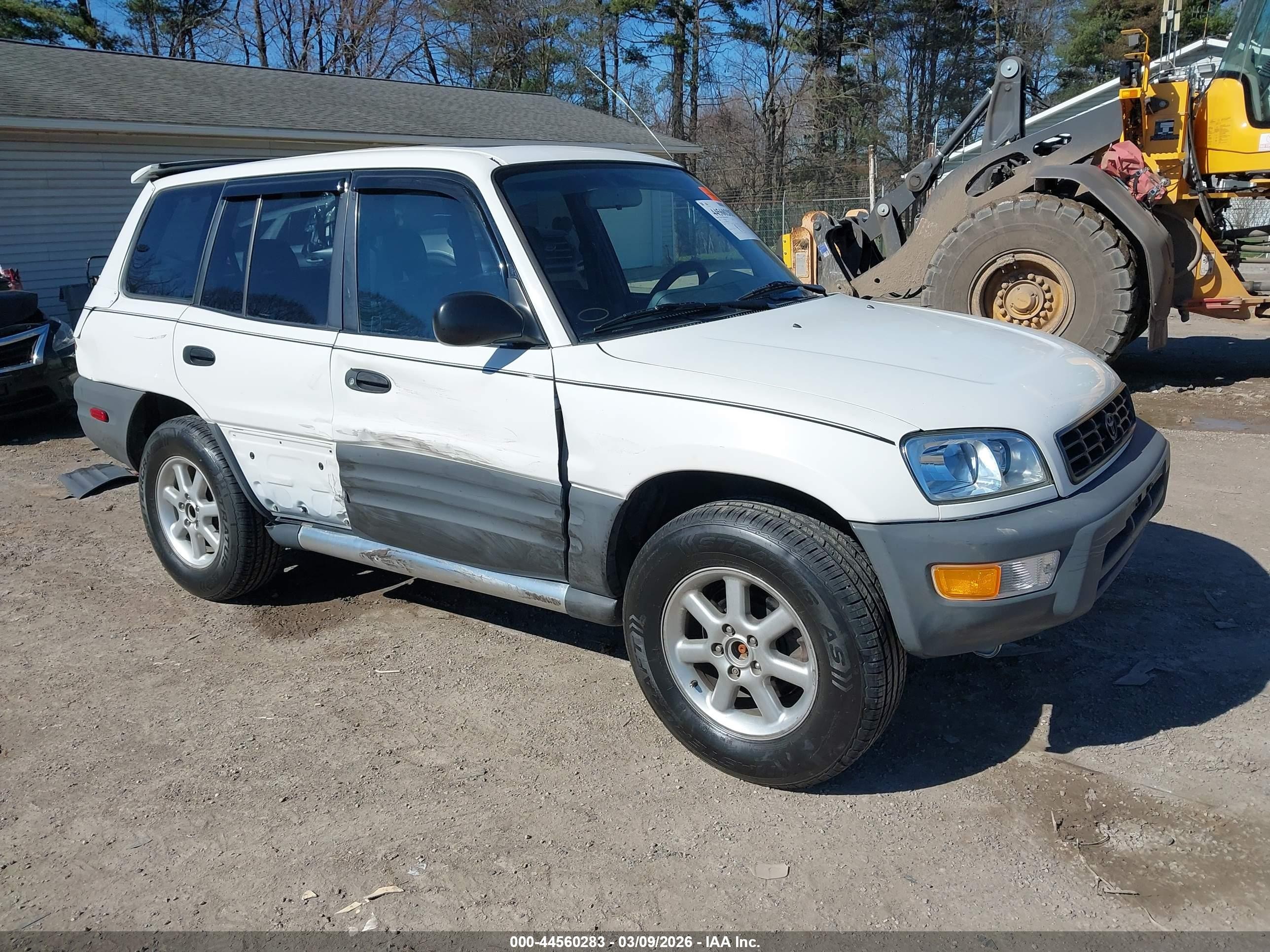 1998 Toyota RAV4, VIN JT3GP10V6W0024277 — Side
