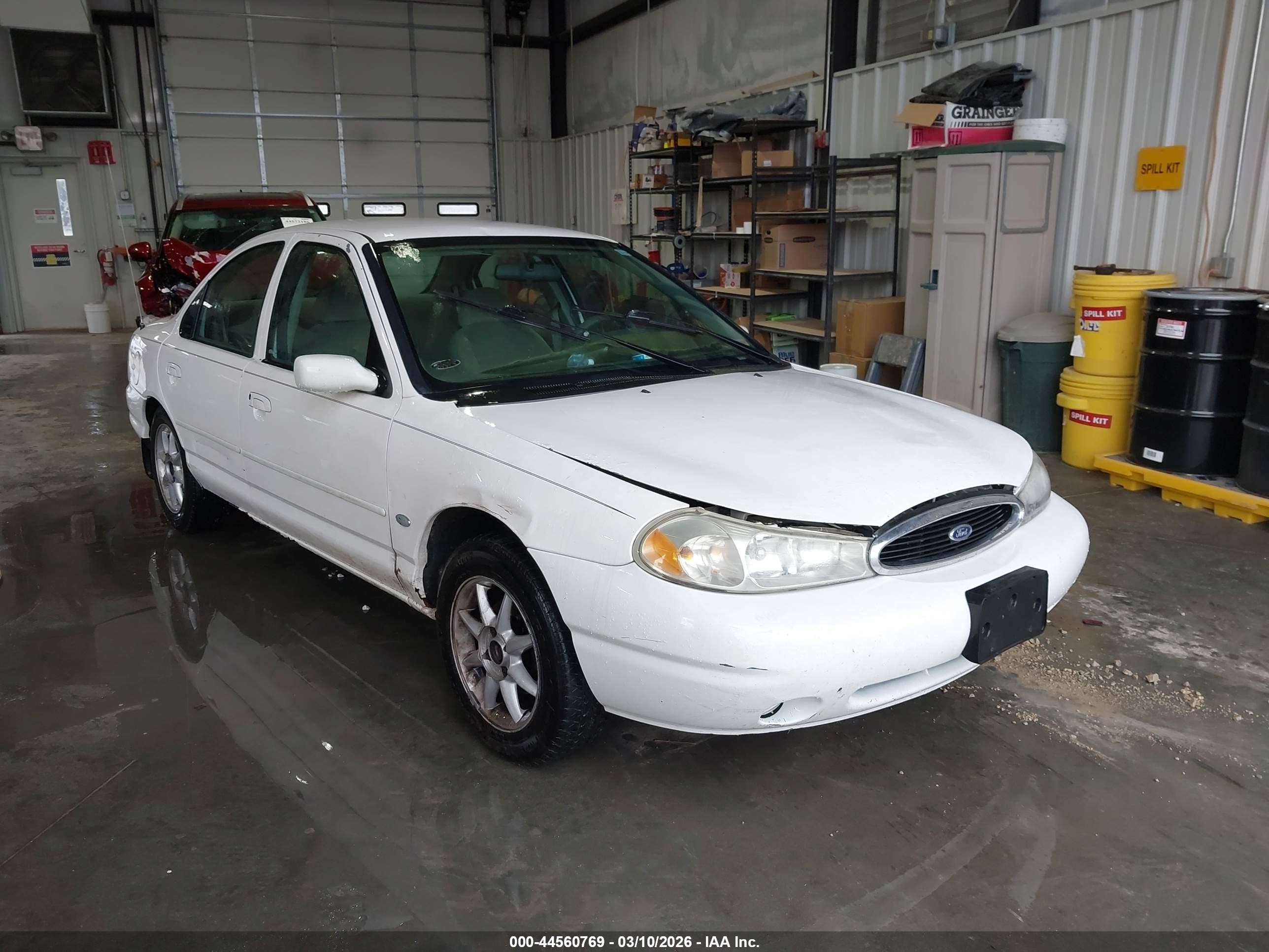 1999 Ford Contour SE, VIN 1FAFP6630XK119729 — Side