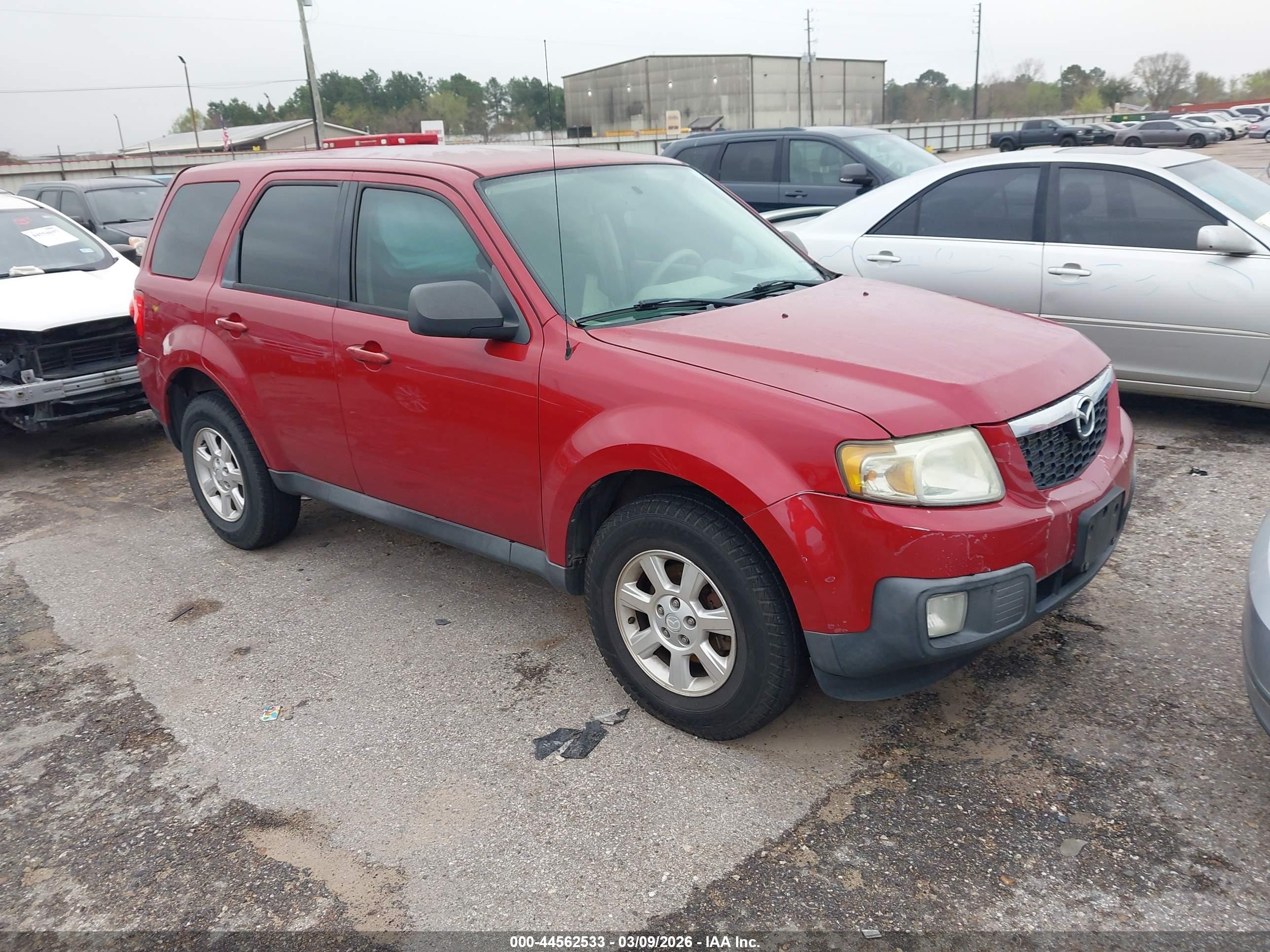 2011 Mazda Tribute Sport, VIN 4F2CY0C73BKM05761 — Зад