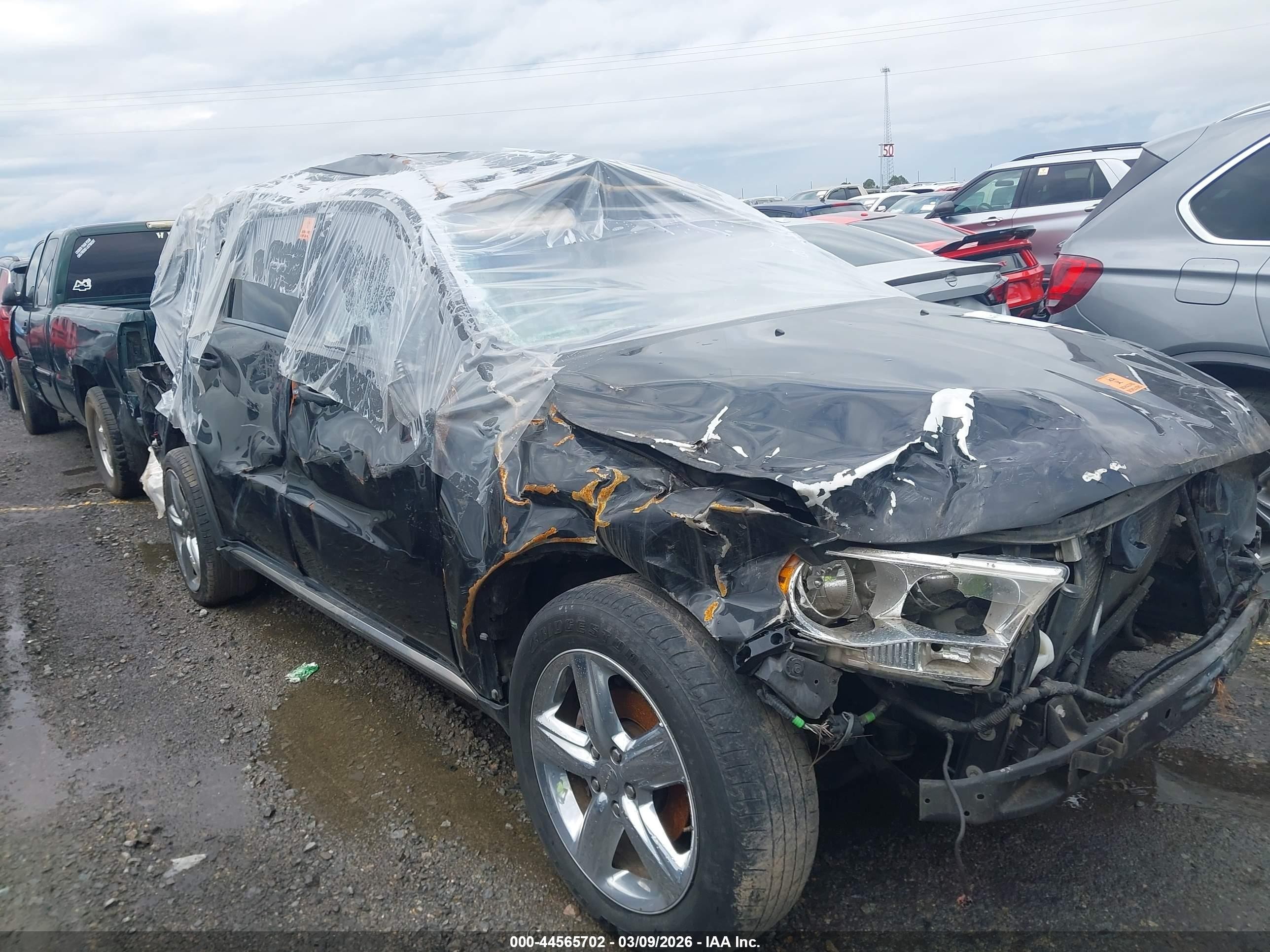 2013 Dodge Durango SXT, VIN 1C4RDHAG4DC692998 — Rollover