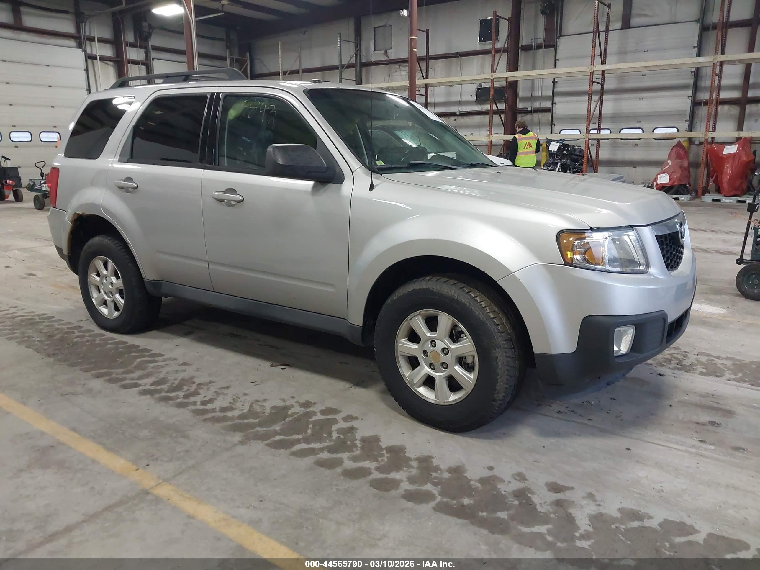 2009 Mazda Tribute Touring, VIN 4F2CZ92799KM05843 — Бок
