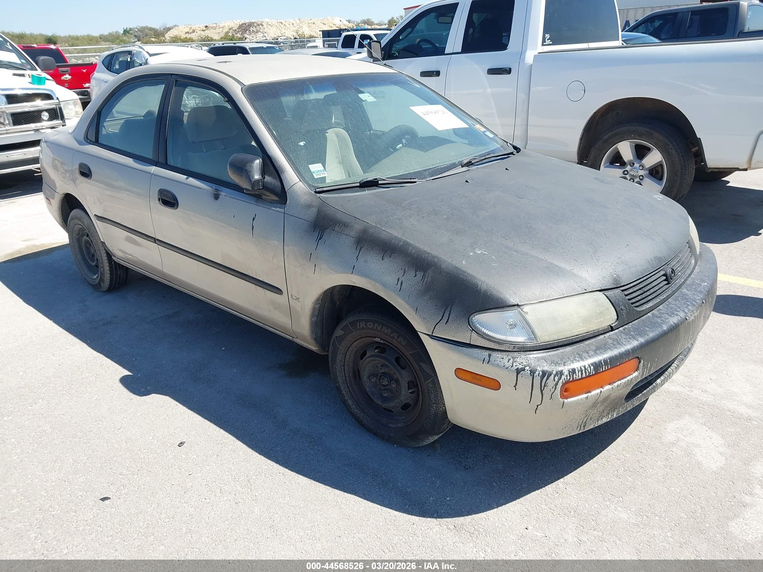 1996 Mazda Protege DX, VIN JM1BB1417T0330296 — Град