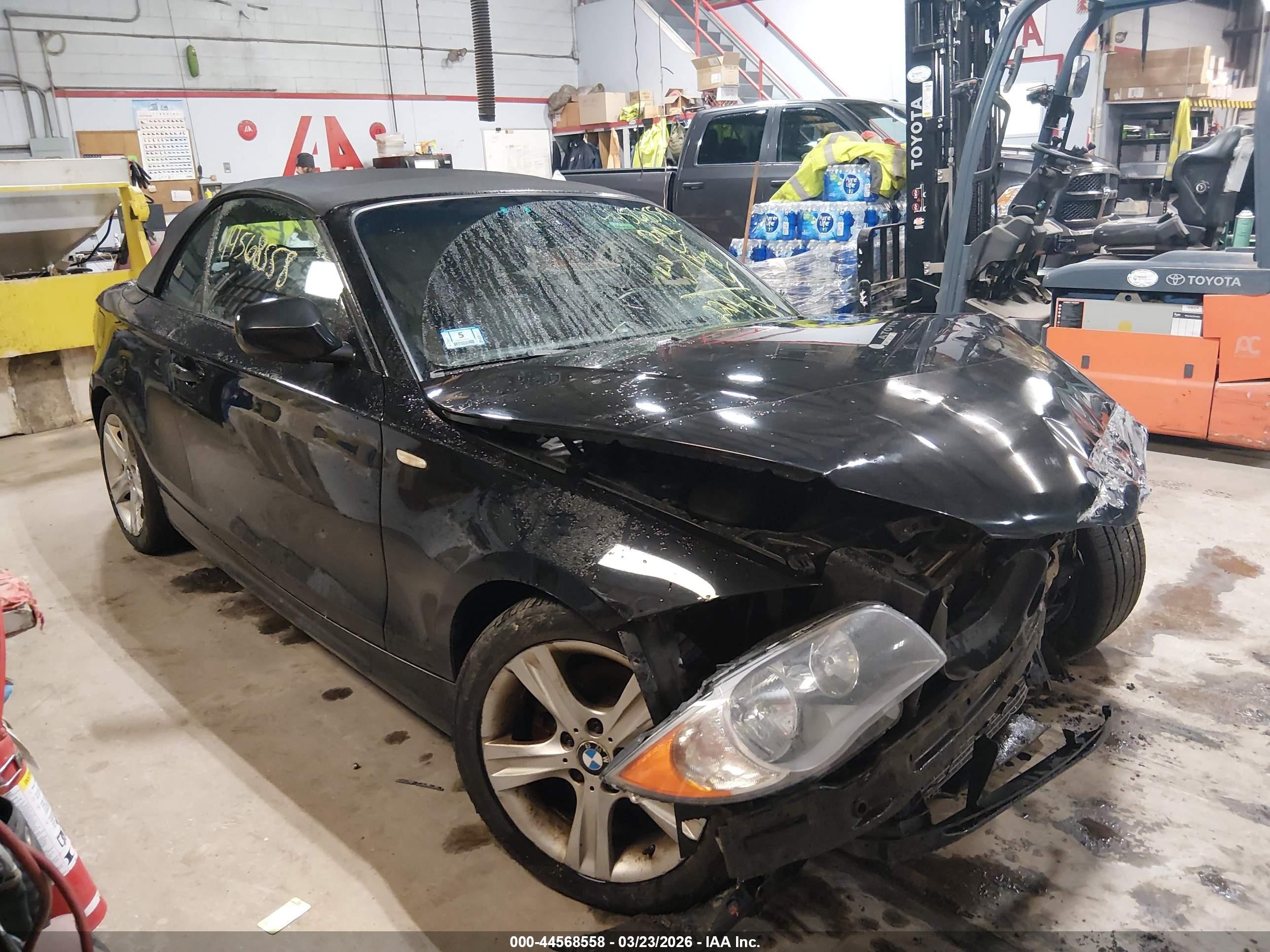 2011 BMW 1 Series 128i, VIN WBAUL7C52BVM79792 — Rear end