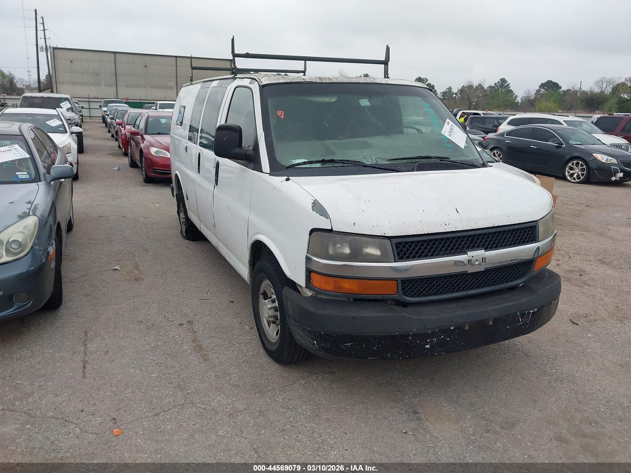 2011 Chevrolet Express Cargo, VIN 1GCWGFCA4B1112682 — Normal wear