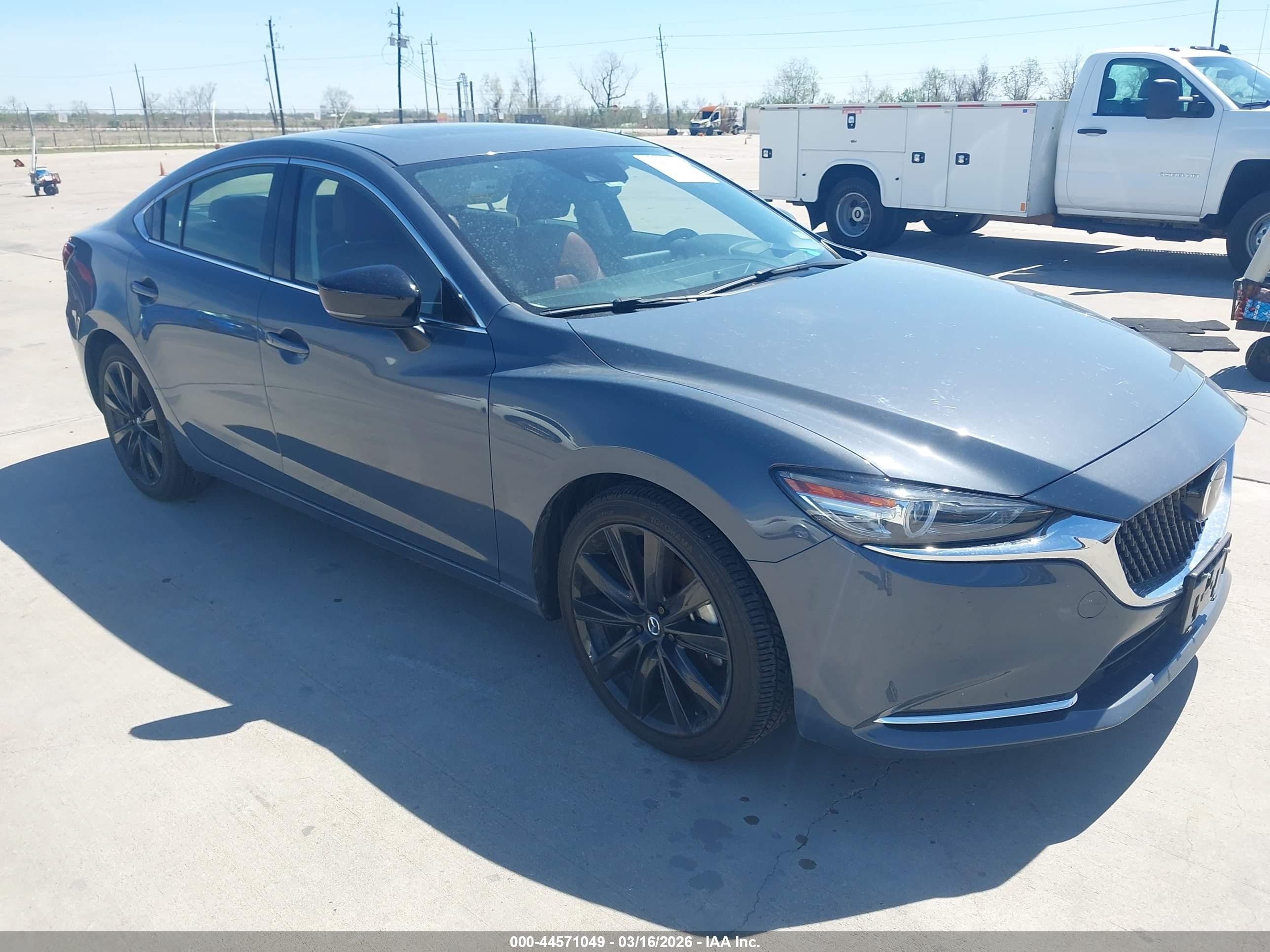 2021 Mazda 6 Carbon Edition, VIN JM1GL1WY1M1618131 — Пресная вода