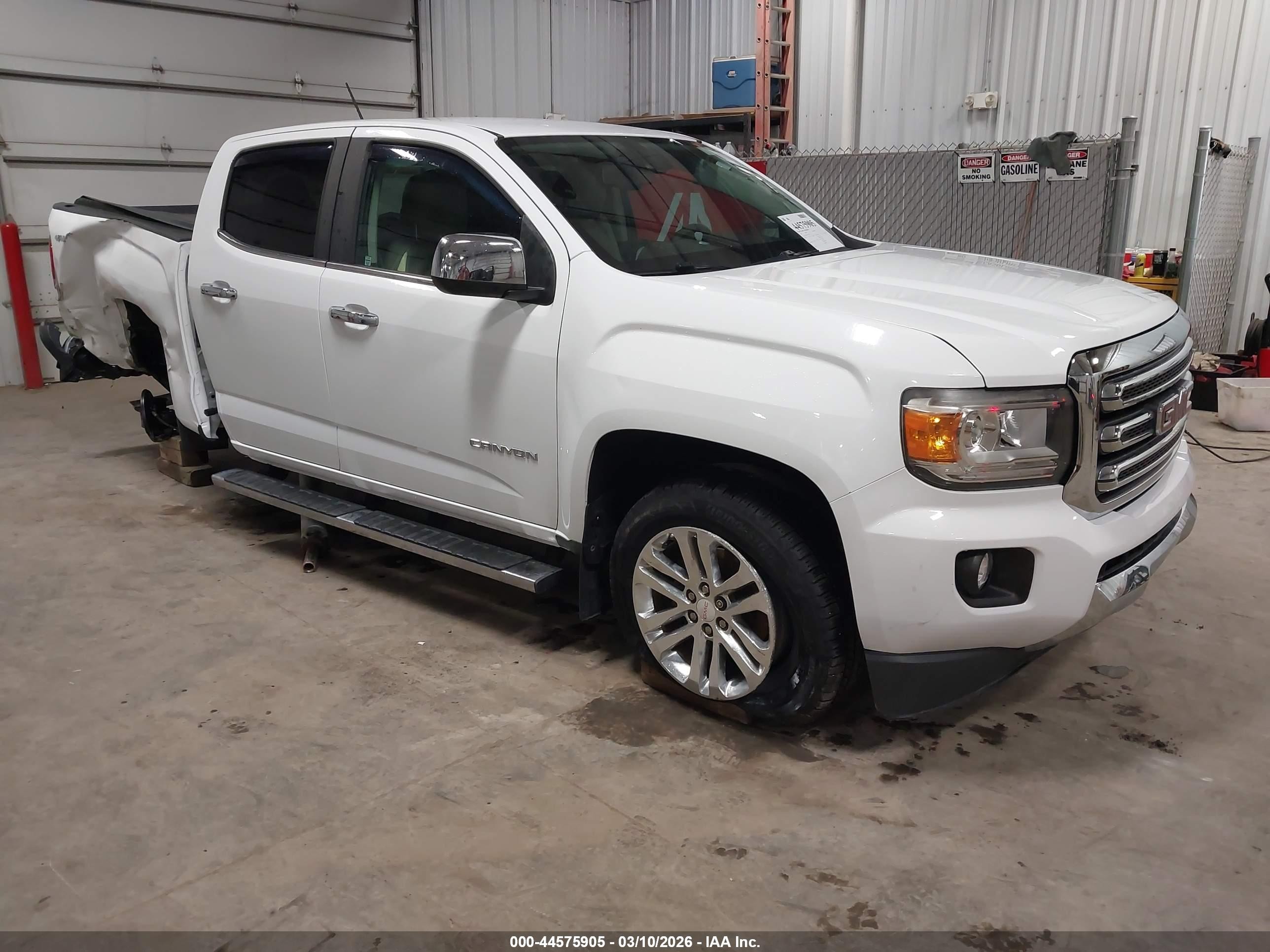 2015 GMC Canyon 4WD SLT, VIN 1GTG6CE39F1167199 — Side